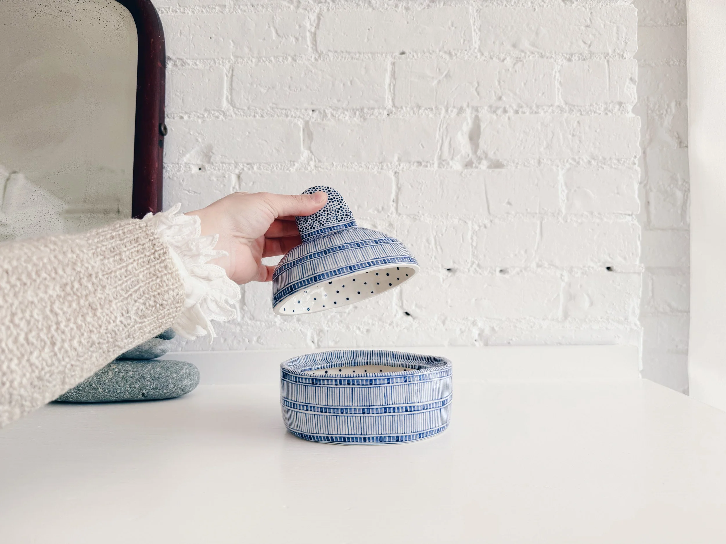 Blue and white, handmade ceramic jar.