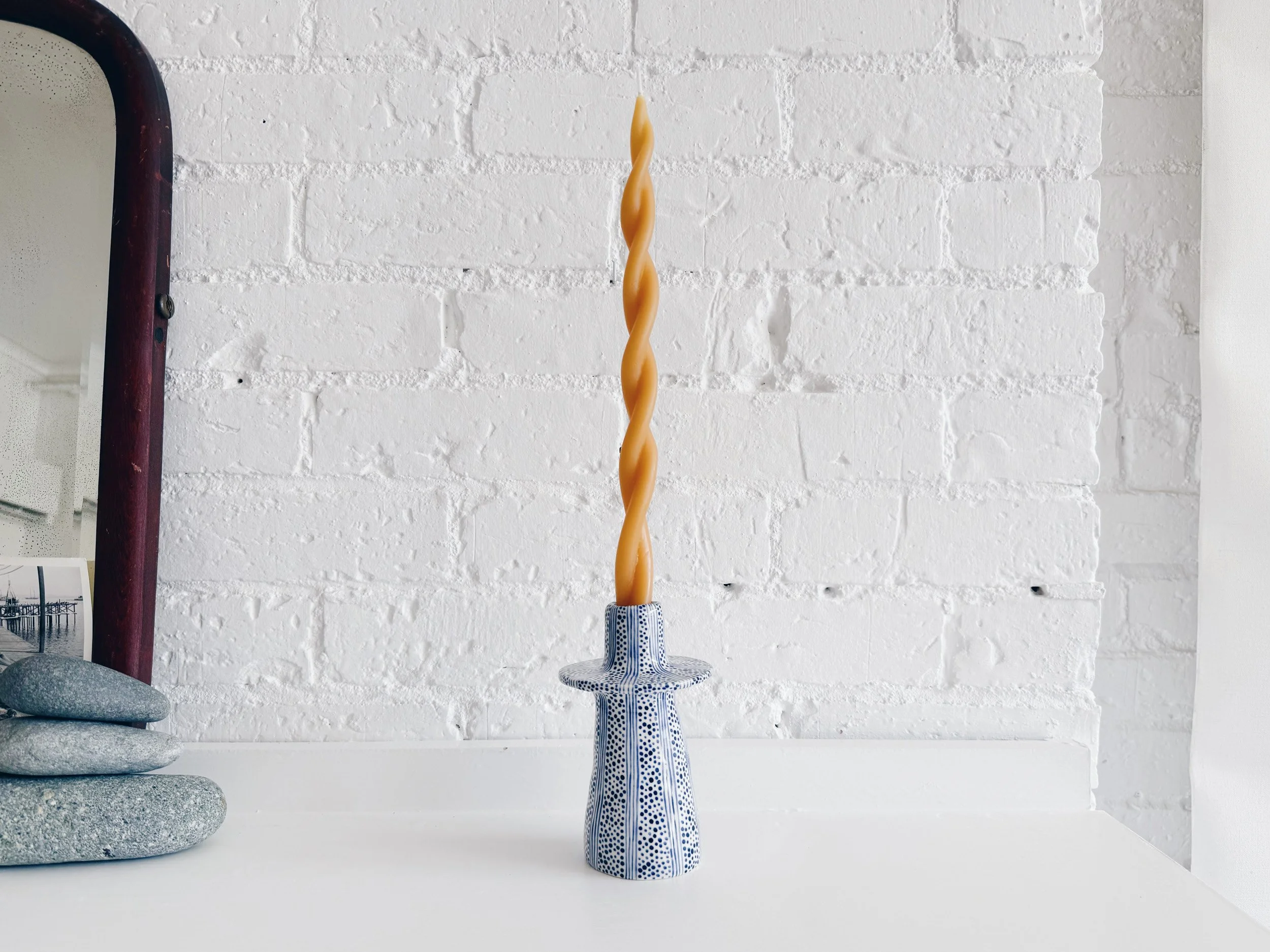 Blue and white, handmade ceramic candleholder.