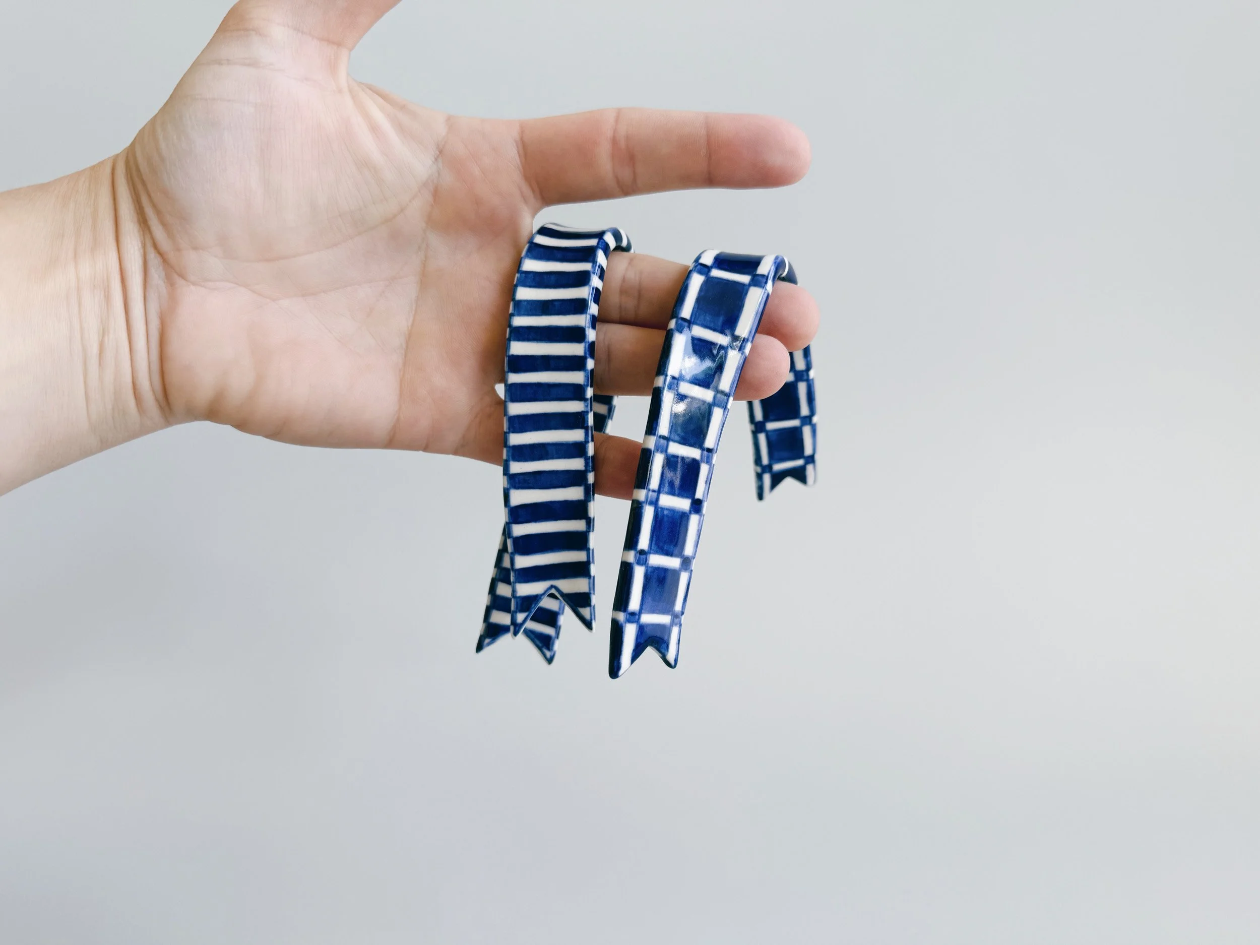 Blue and white, handmade ceramic ribbon