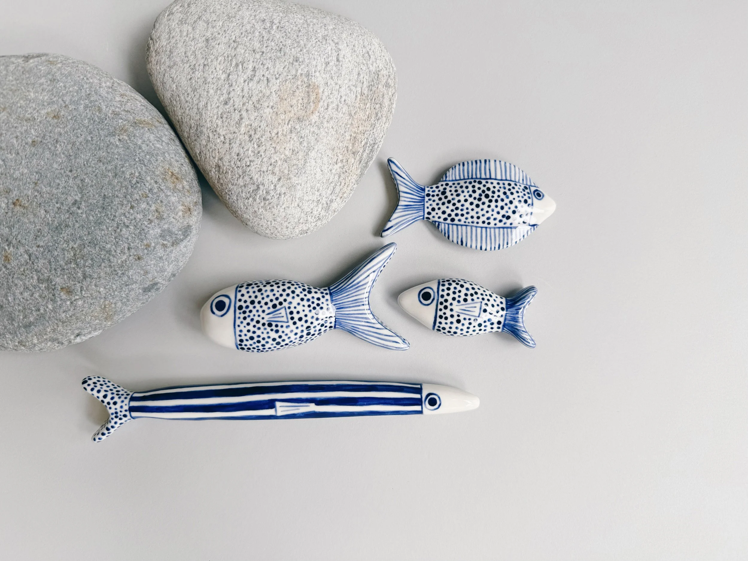 Blue and white, handmade ceramic fish.