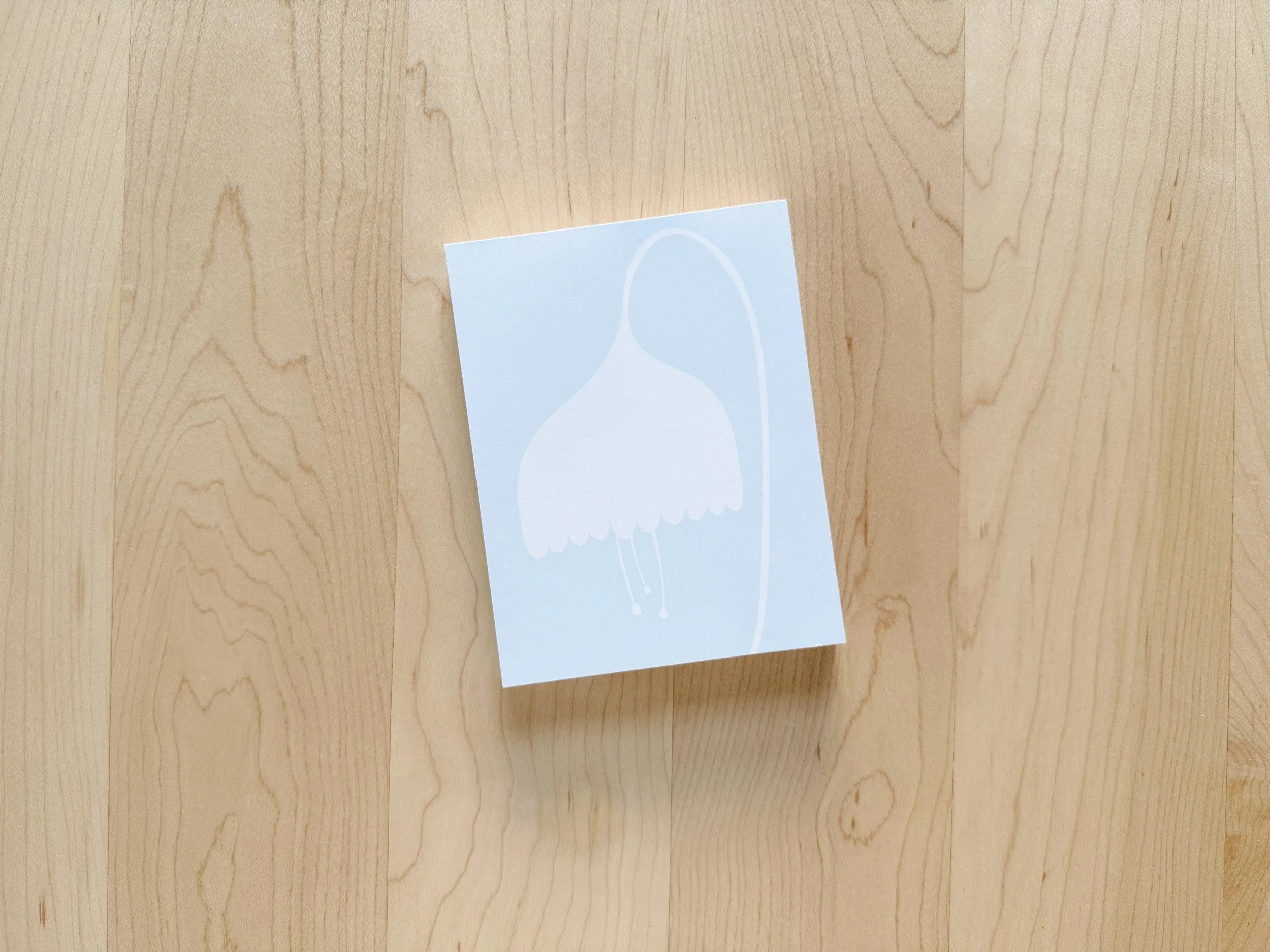 Notepad with flower design.