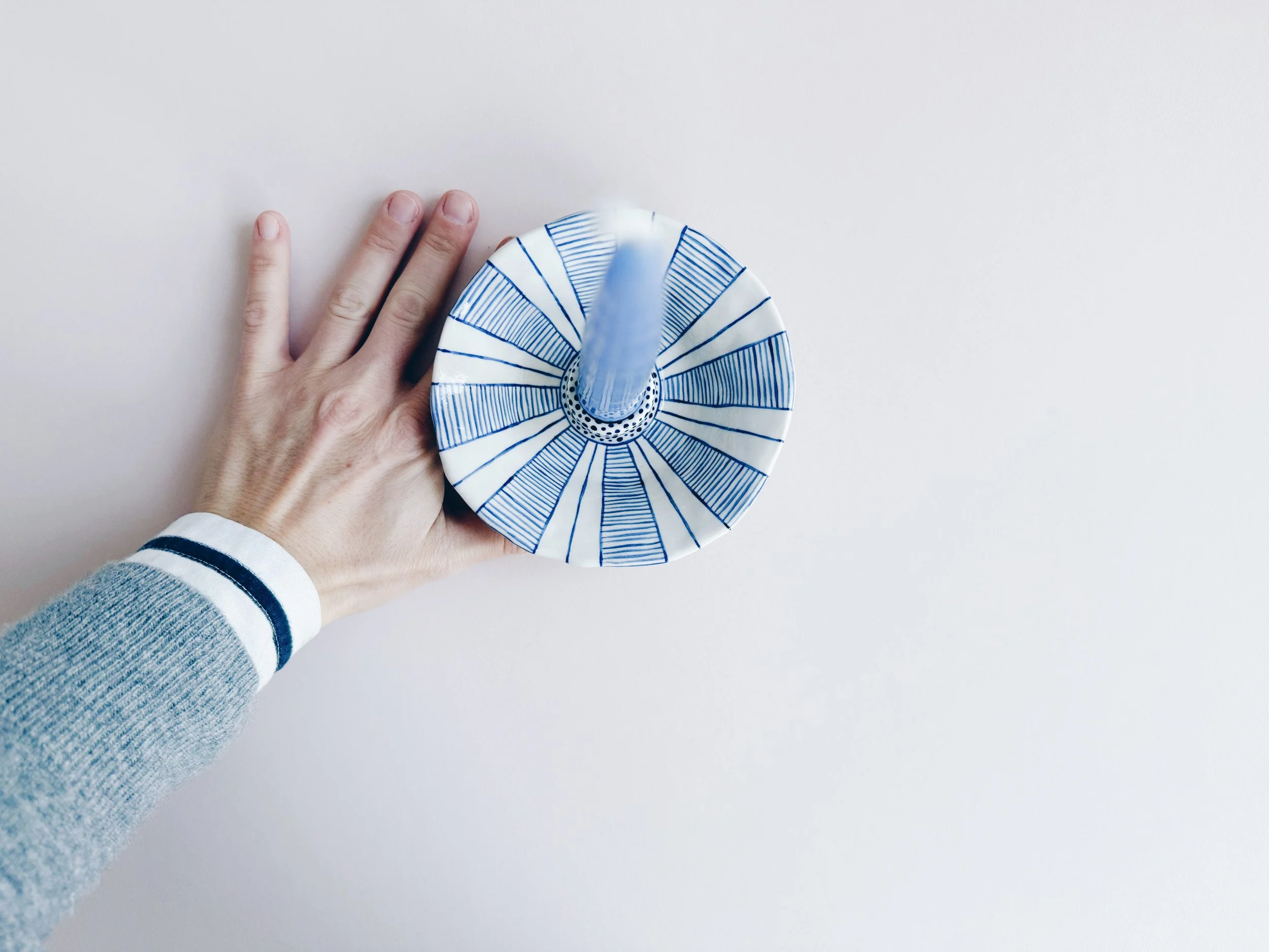 Blue and white, handmade ceramic candleholder.