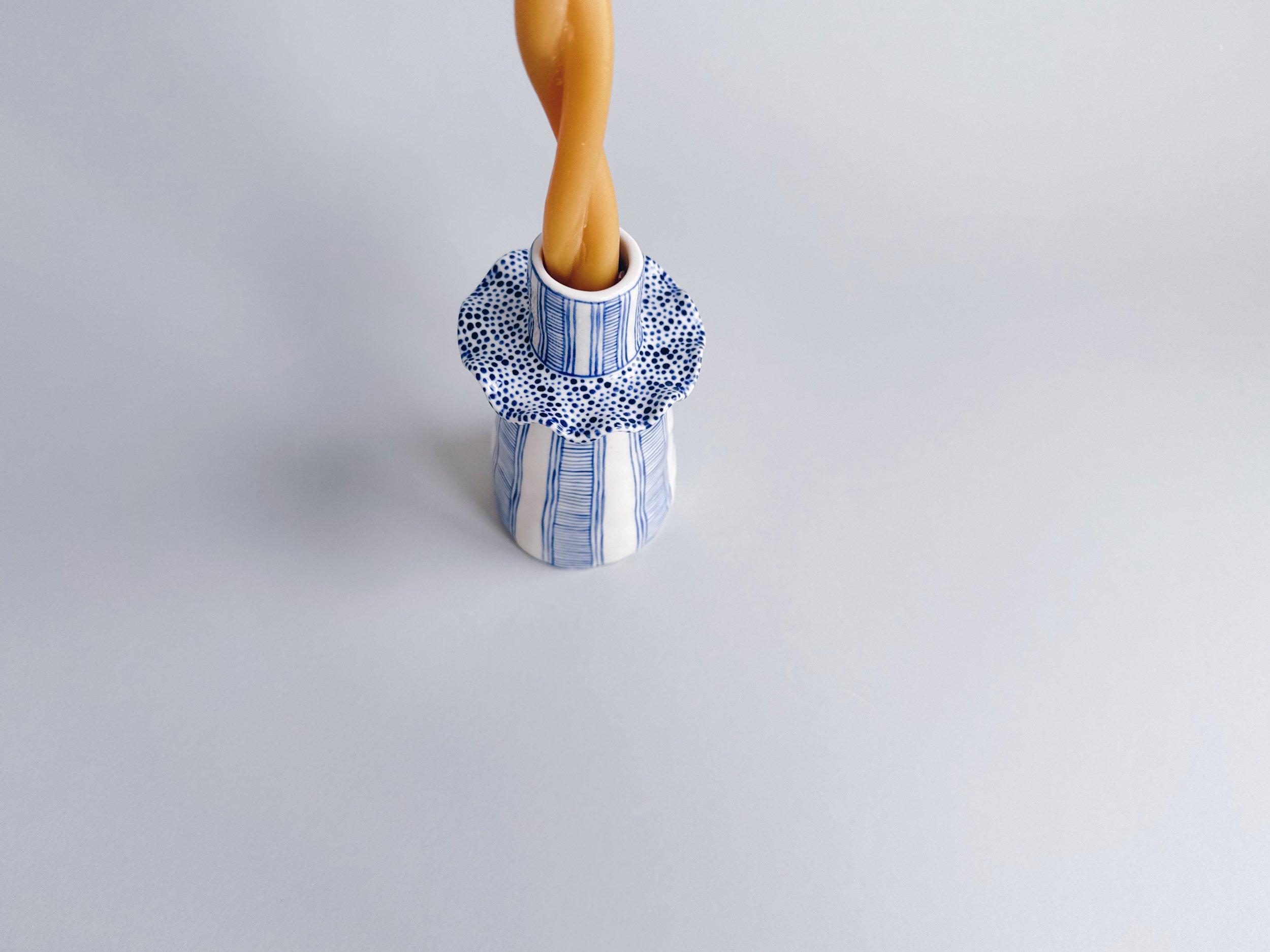 Blue and white, handmade ceramic candleholder.