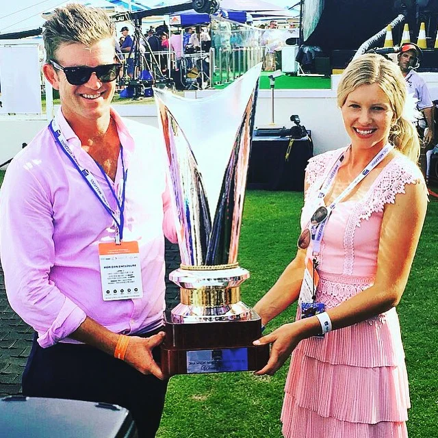 Julian Blaxland & partner Kacy Fogden with Sunlight's 2018 $2m Magic Millions Classic trophy