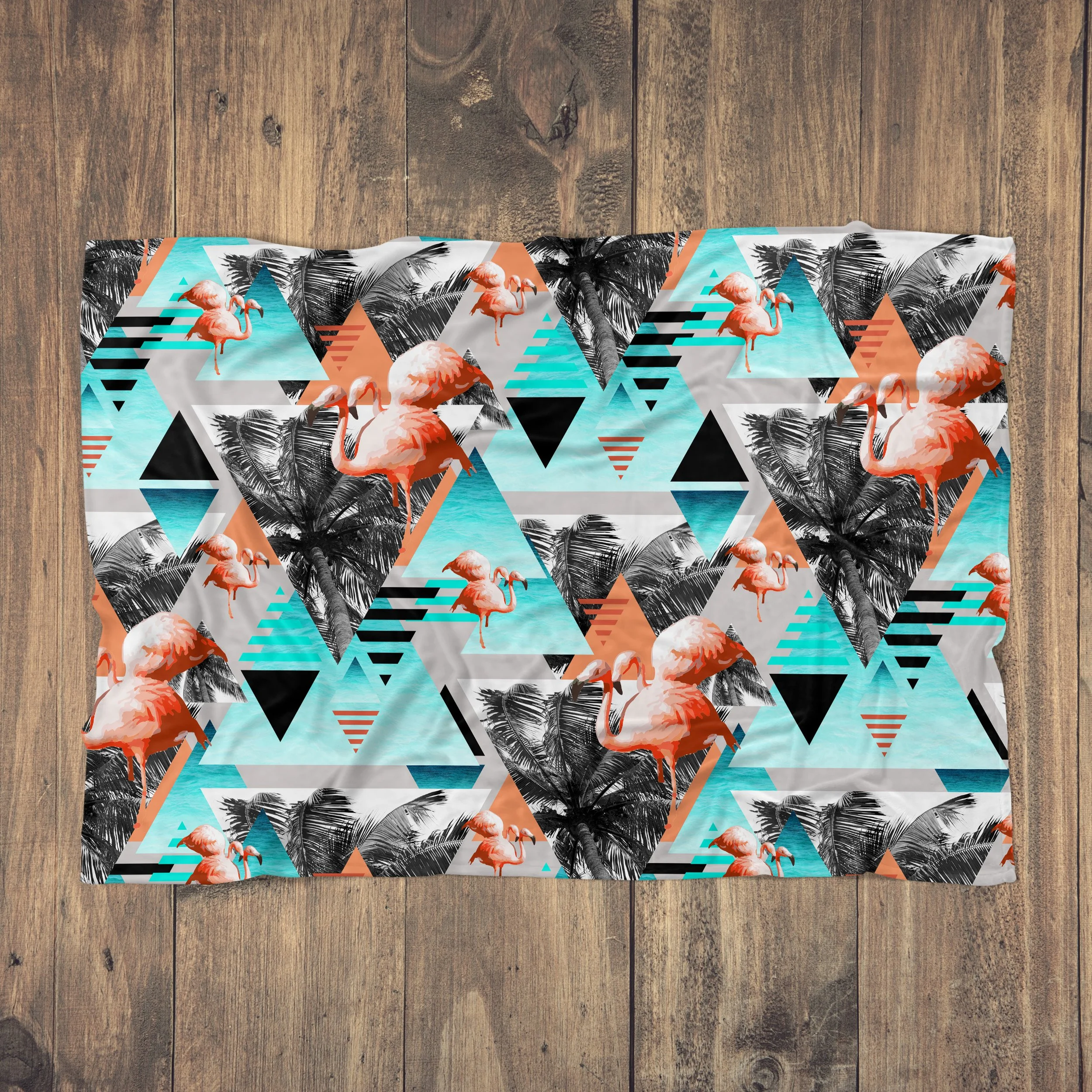 Paradise Flamingos - Fleece Blanket on Wood Floor.jpg