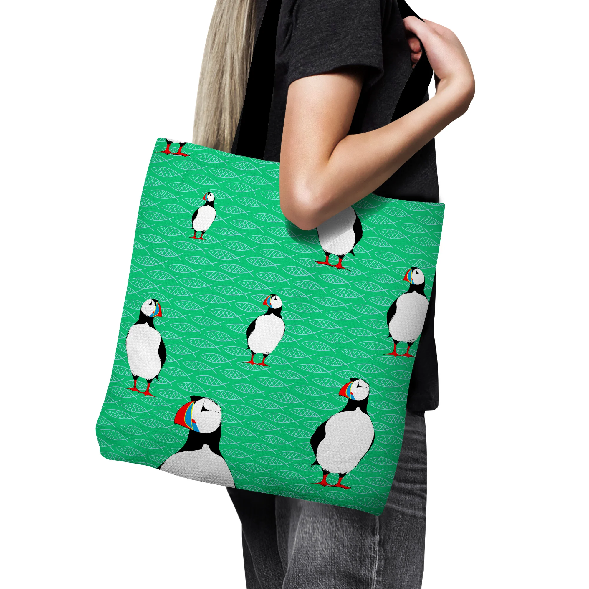 Puffins and Fish by Elisabeth Maurland - Tote Bag