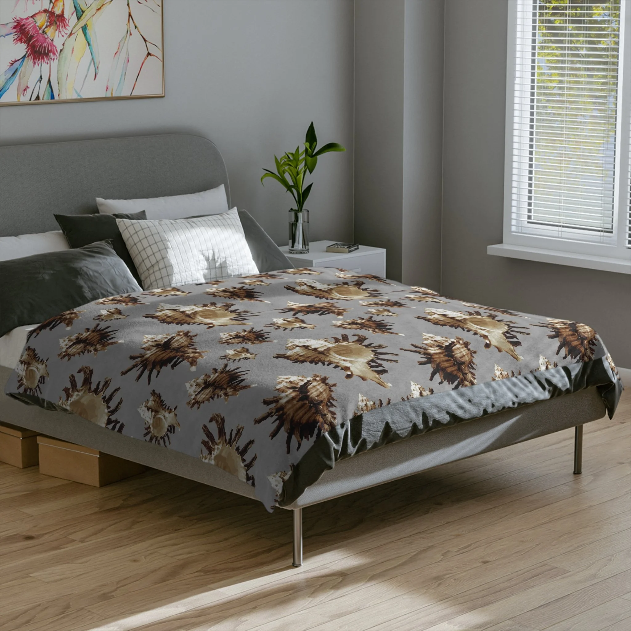 Spiky Conches (on Gray) - Fleece Blanket on Bed.png