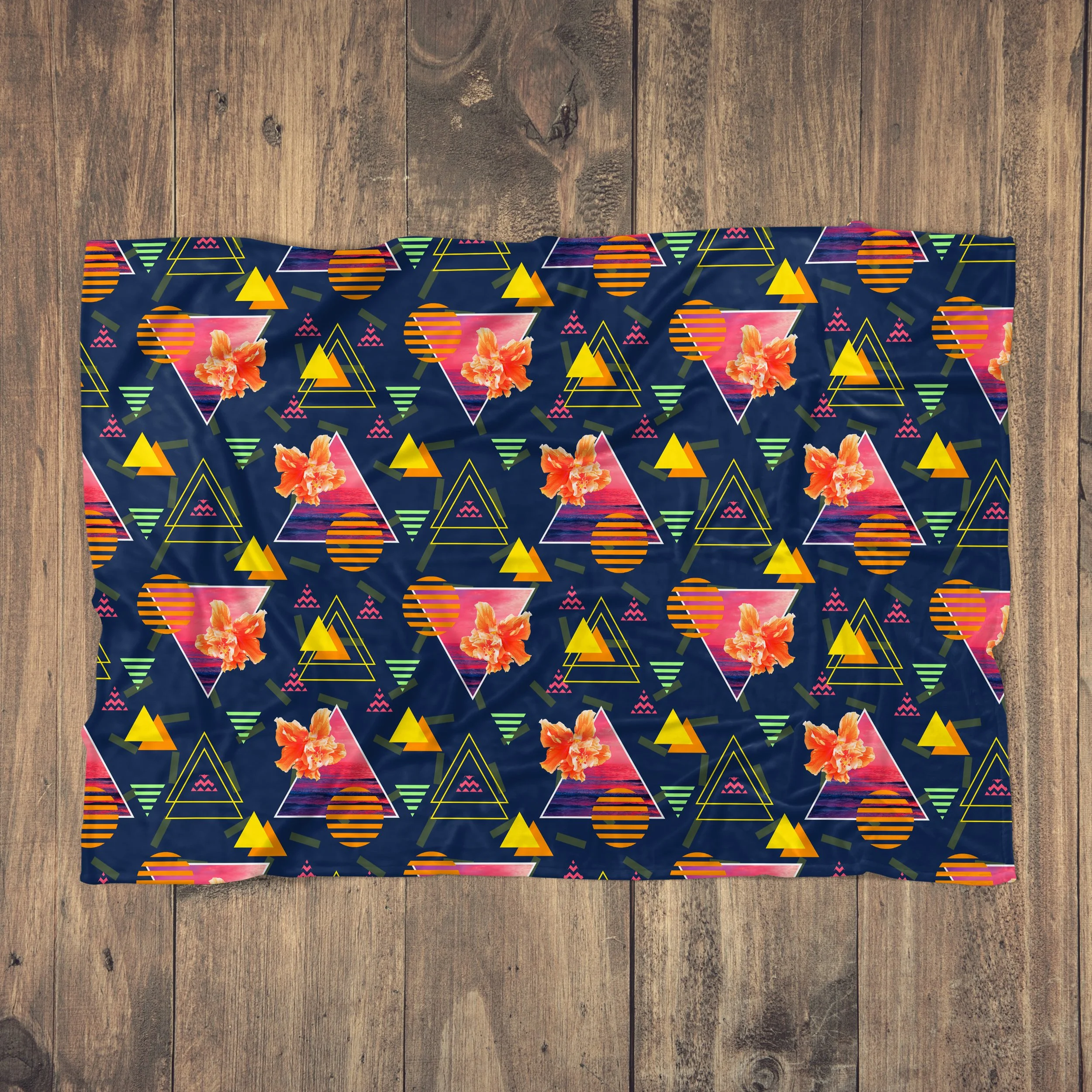 Hibiscus Sunrise - Fleece Blanket on Wood Floor.jpg