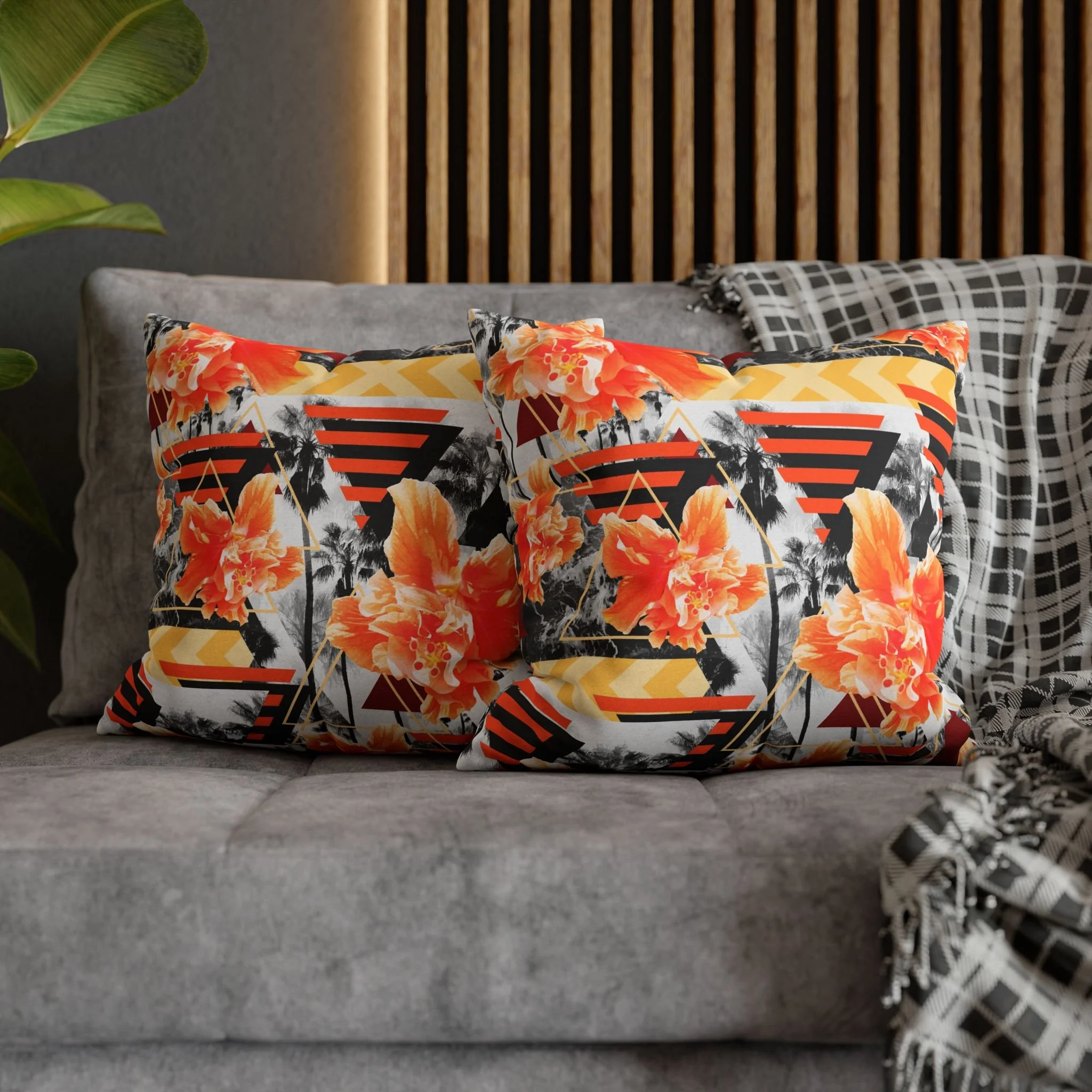 Wild Orange Hibiscus - Matching Pillows on Couch.png