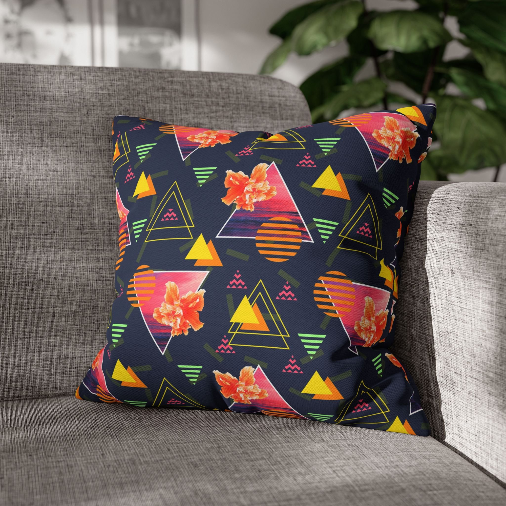 Hibiscus Sunrise - Pillow on Couch.png