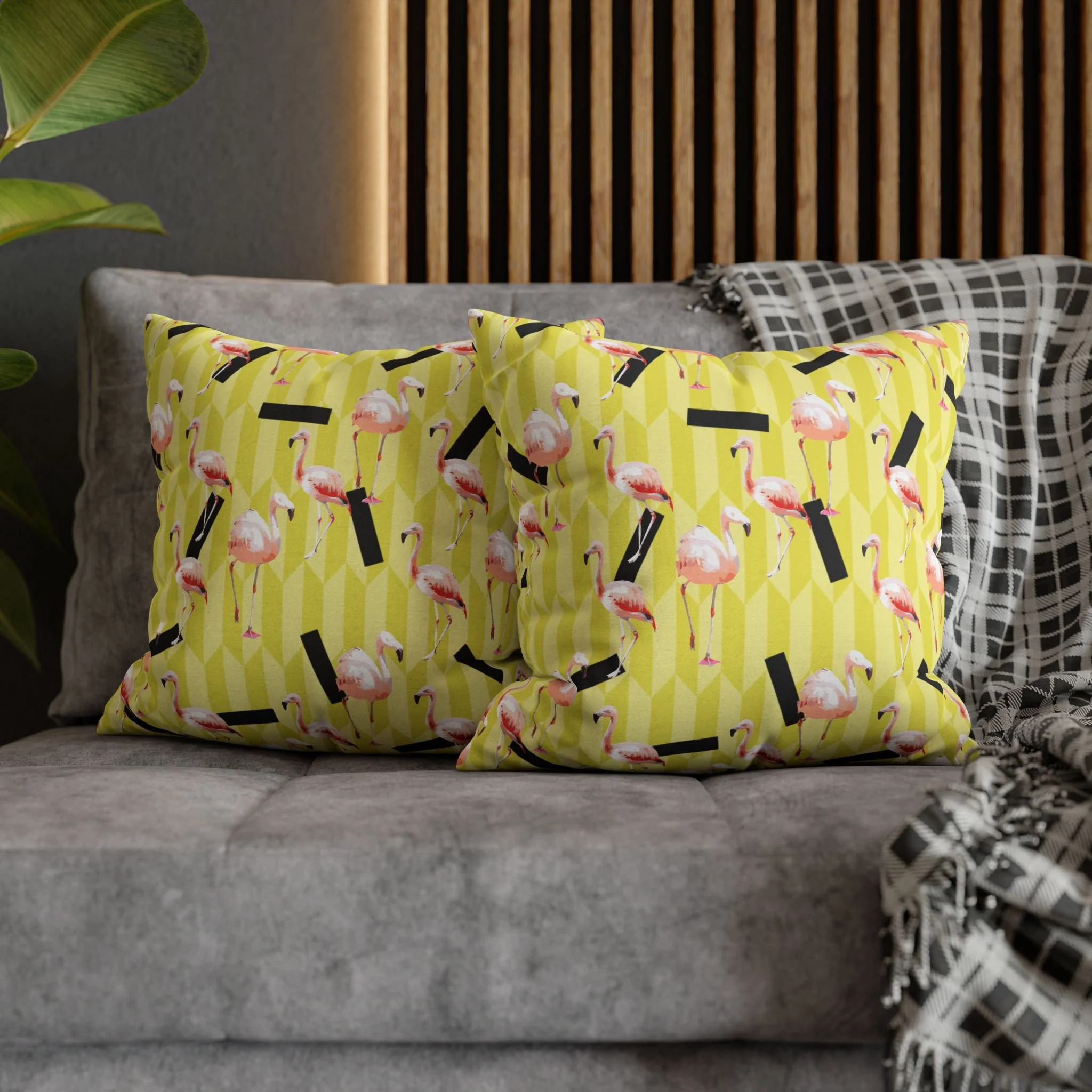 Lemon Flamingos - Throw Pillows on Couch.png
