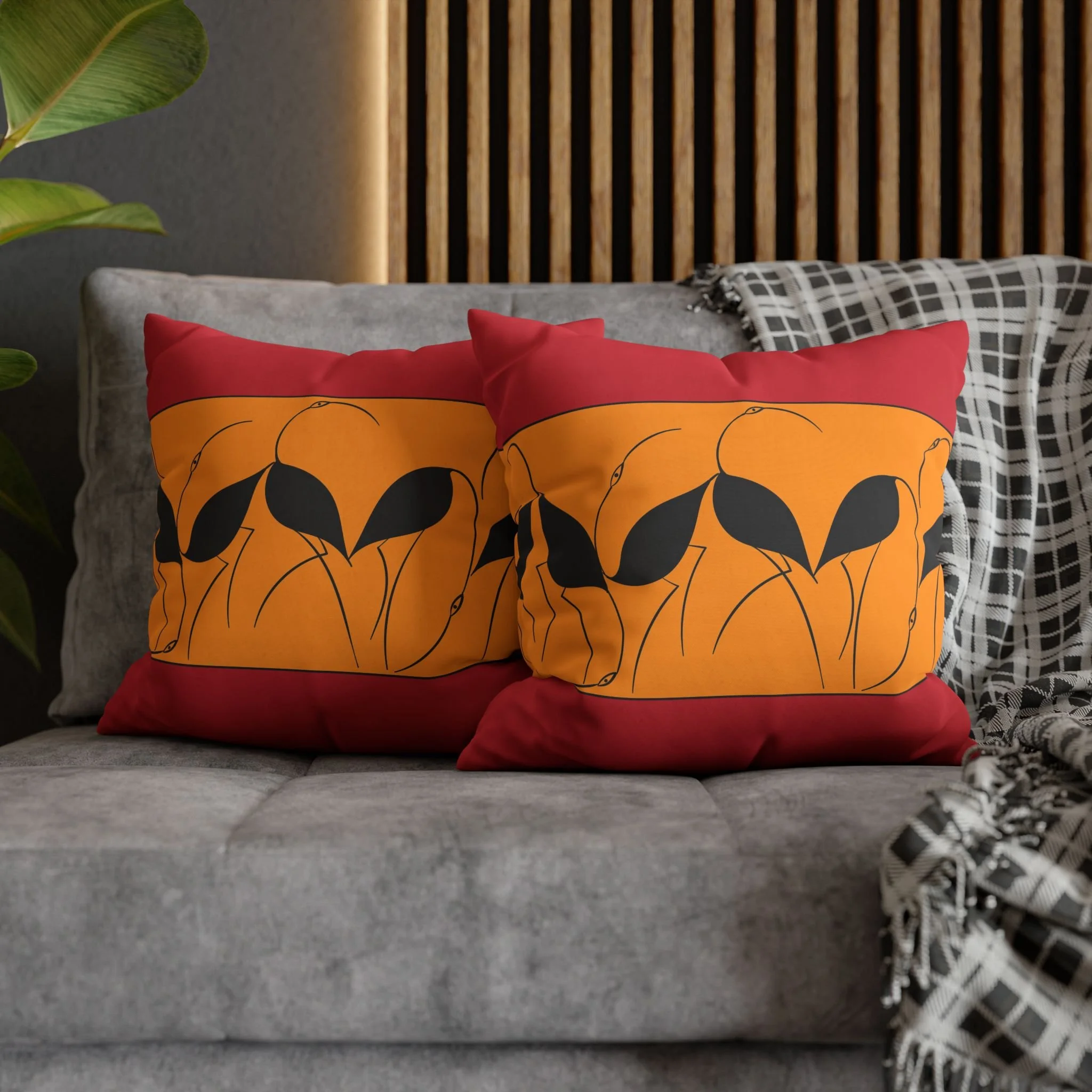 Greek Birds by Elisabeth Maurland - Matching Throw Pillows on Gray Couch.png