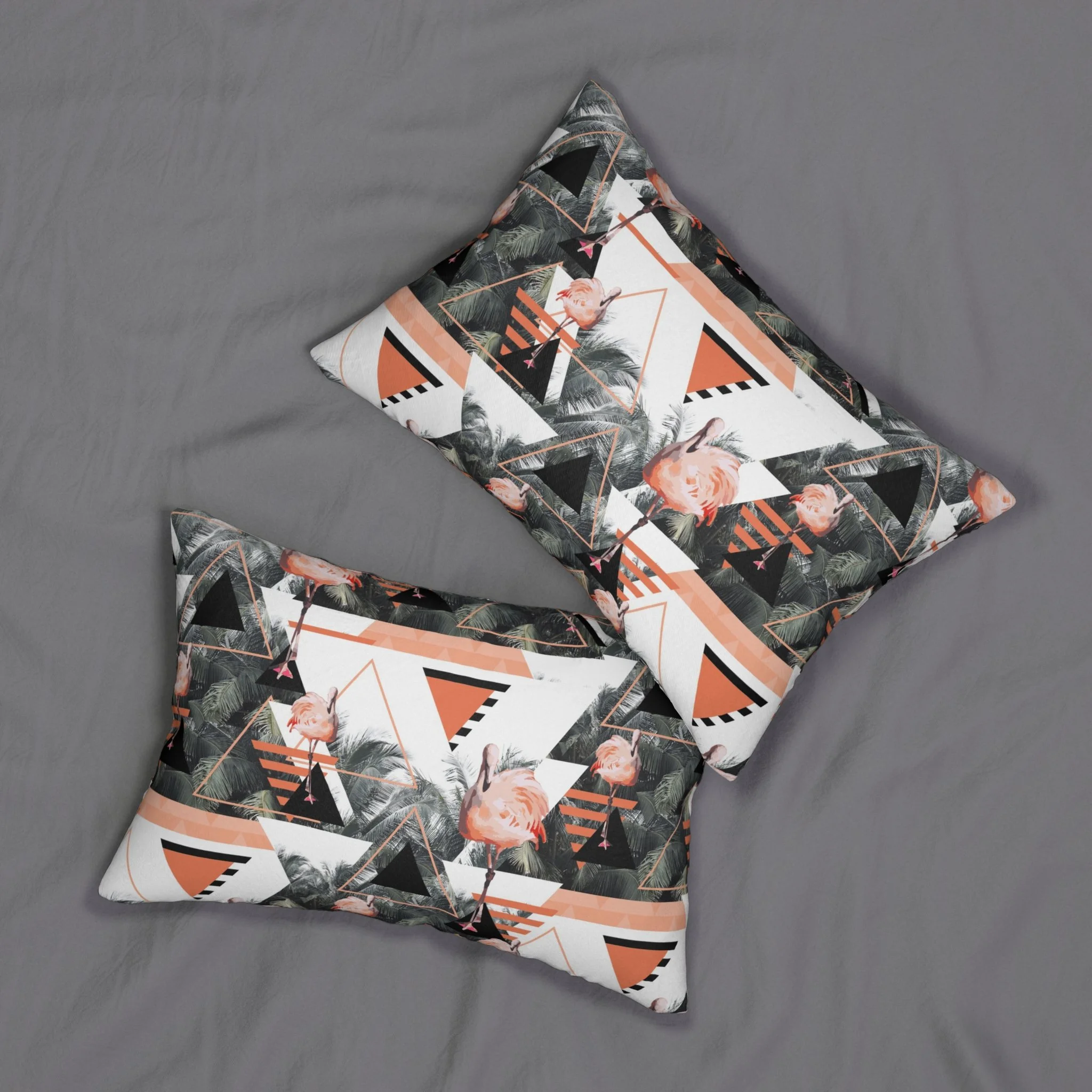 Black Beach Flamingos - Lumbar Pillows on Bed.png