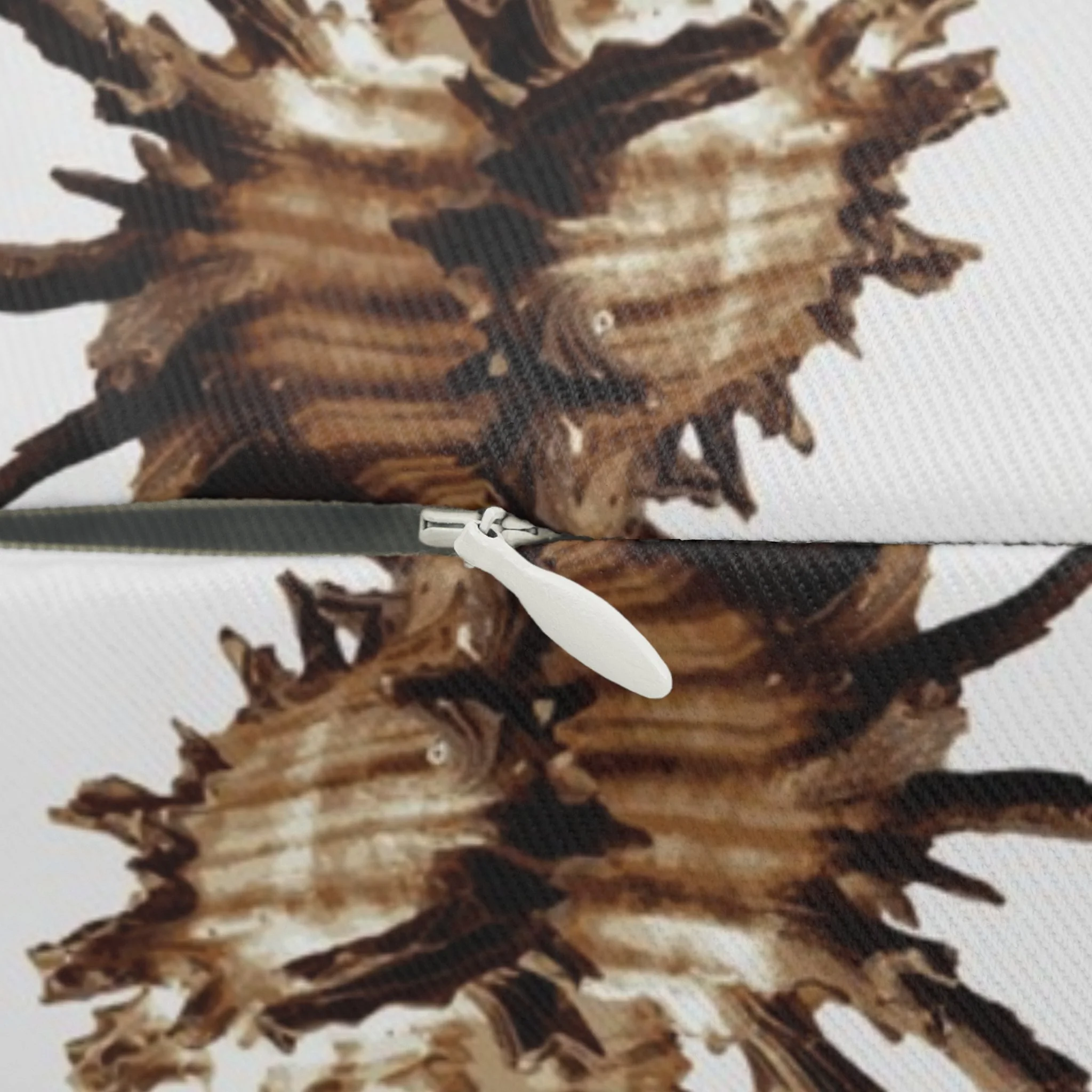 Spiky Conches (on Very Light Gray) - Lumbar Pillow Close-Up.png