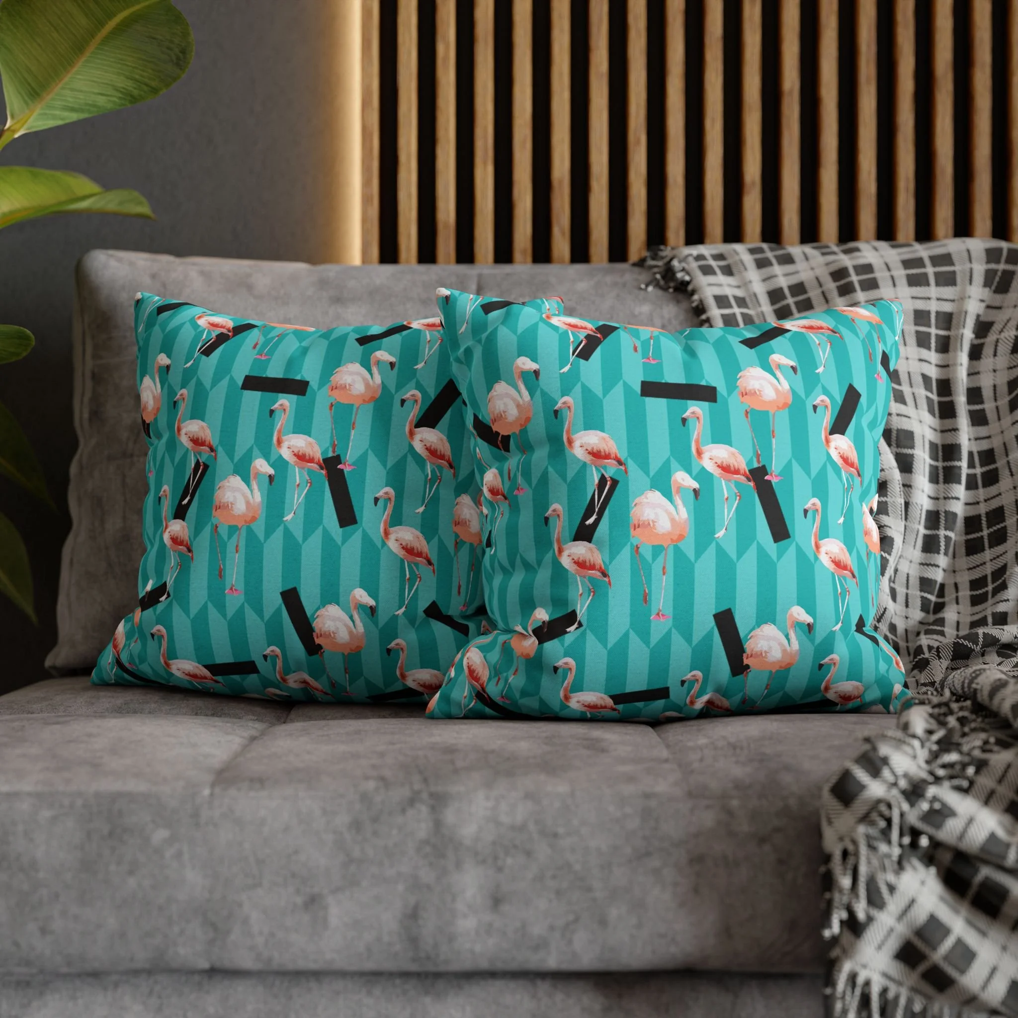 Taffy Flamingos - Throw Pillows on Couch.png