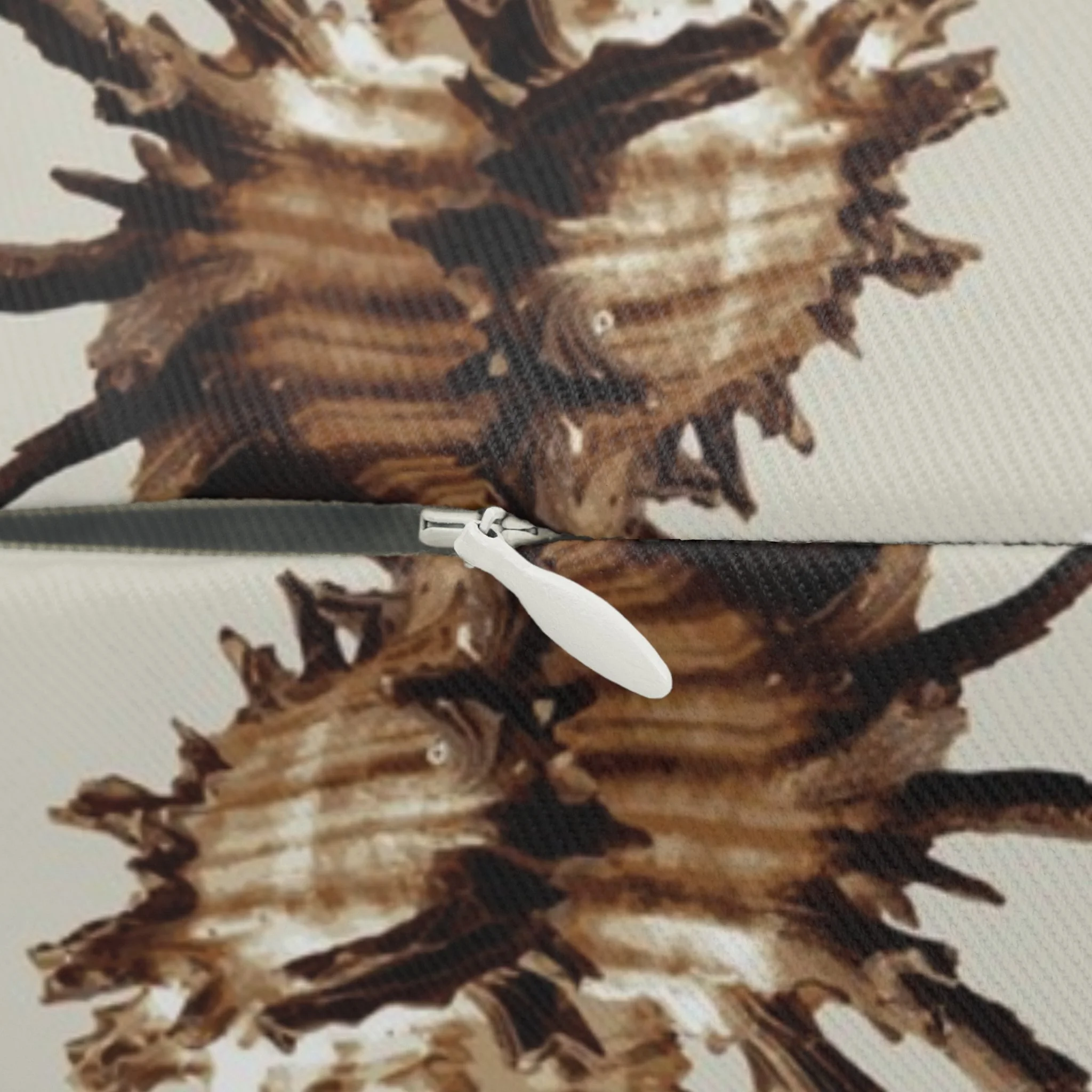 Spiky Conches (on Light Grayish Yellow) - Lumbar Pillow Close-Up.png