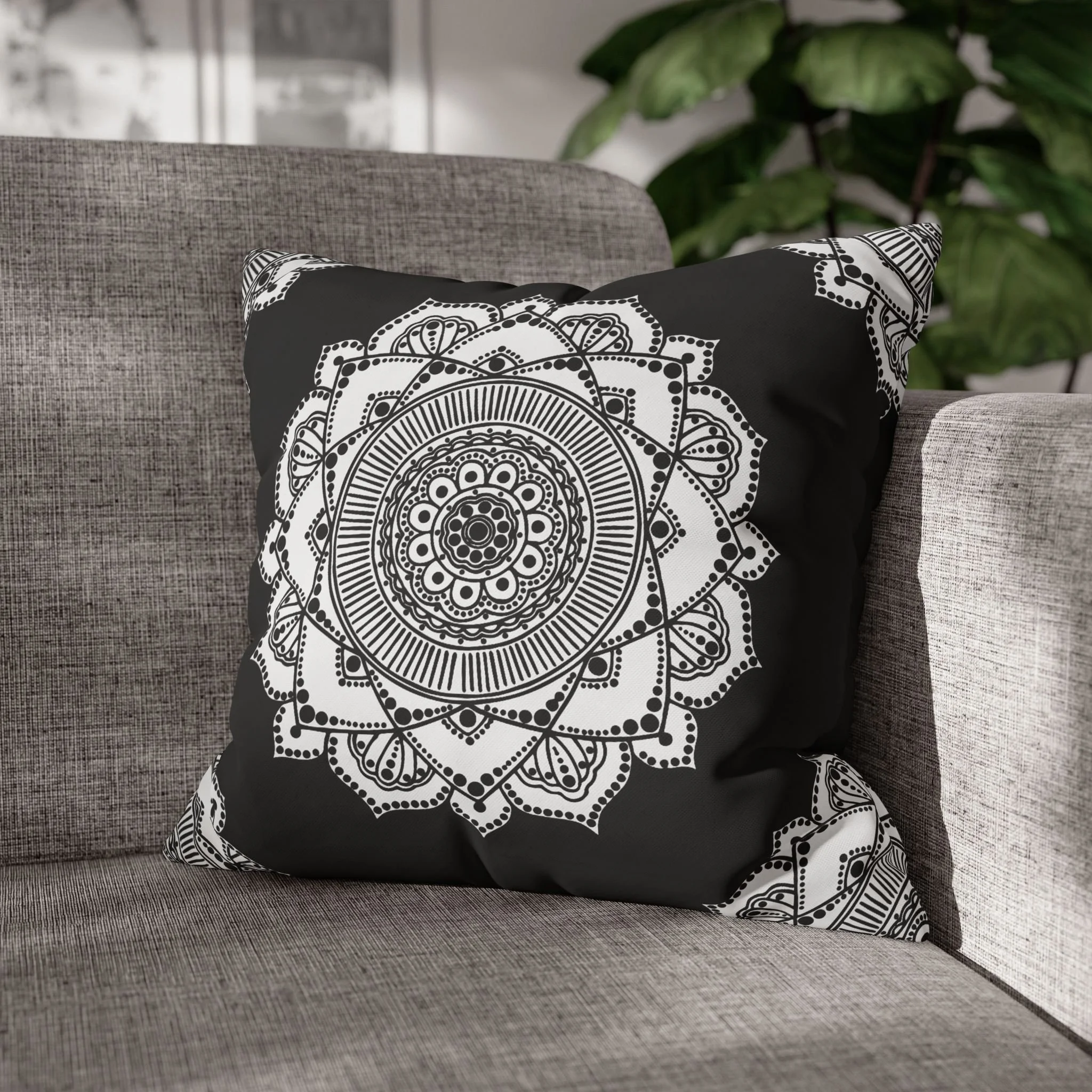 Black and White Mnadala v2 by Erin Witters - Throw Pillow on Gray Couch End.png