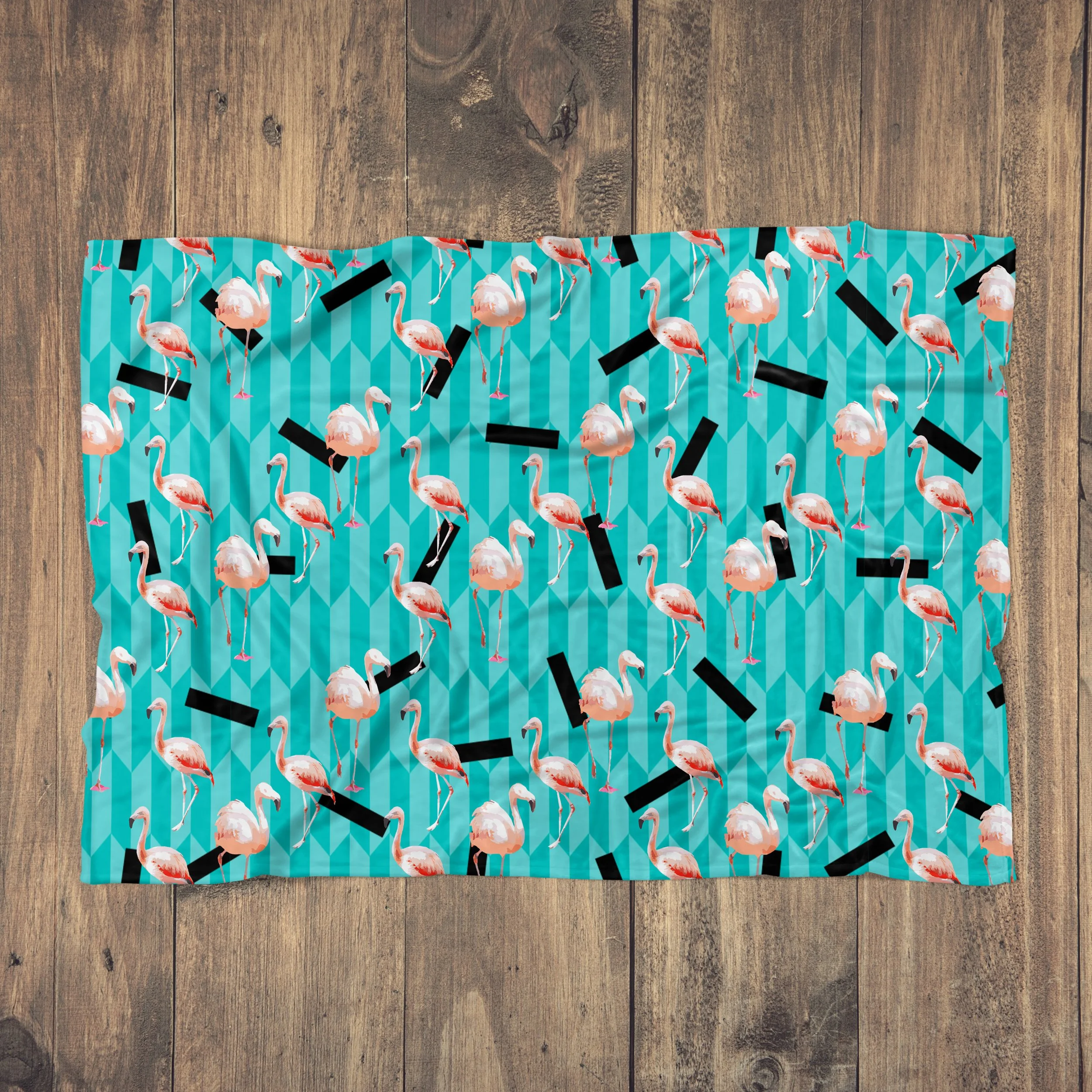 Taffy Flamingos - Fleece Blanket on Wood Floor.jpg