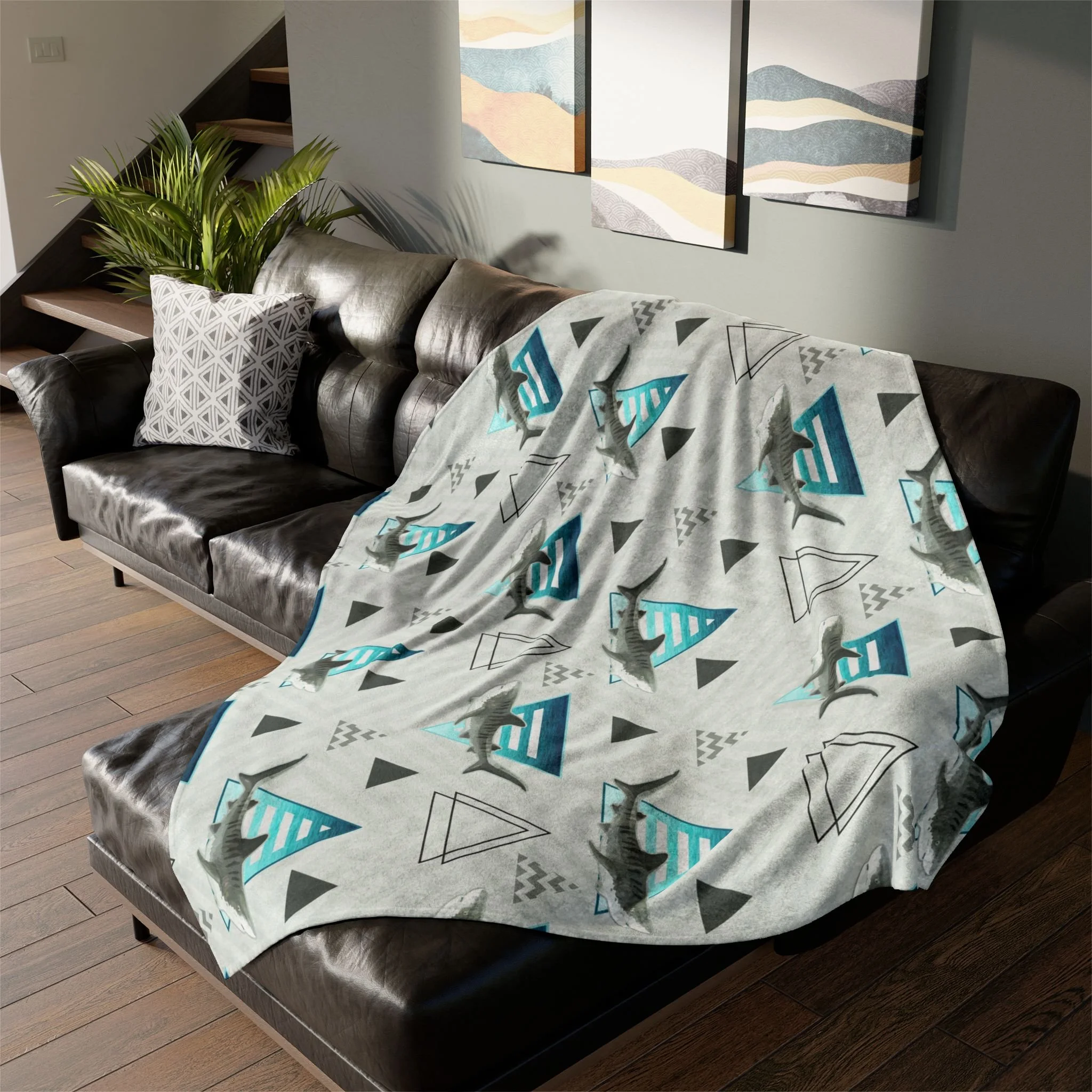 Grand Cayman Tiger Sharks - Fleece Blanket on L-Shaped Sectional.png
