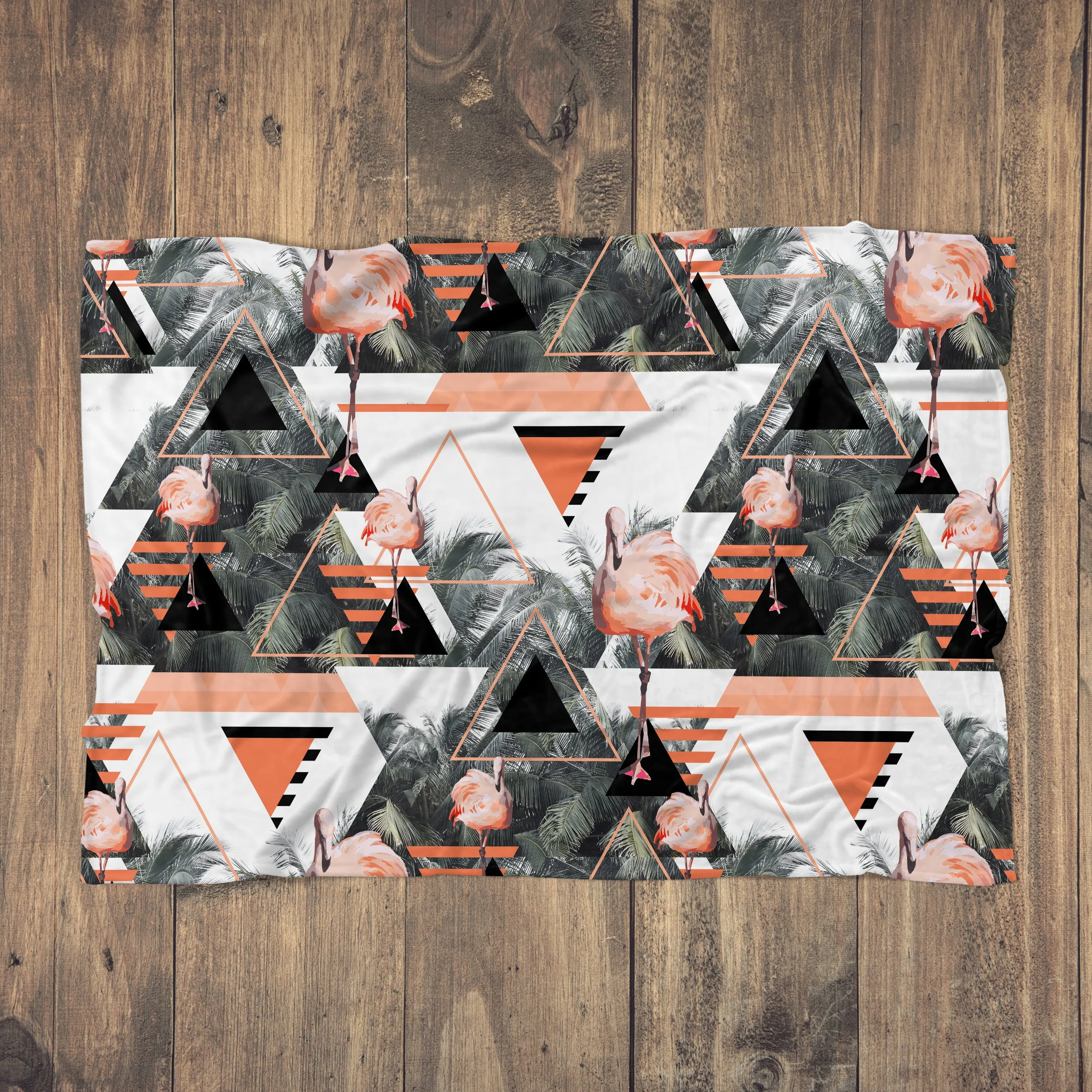 Black Beach Flamingos - Fleece Blanket on Wood Floor.jpg