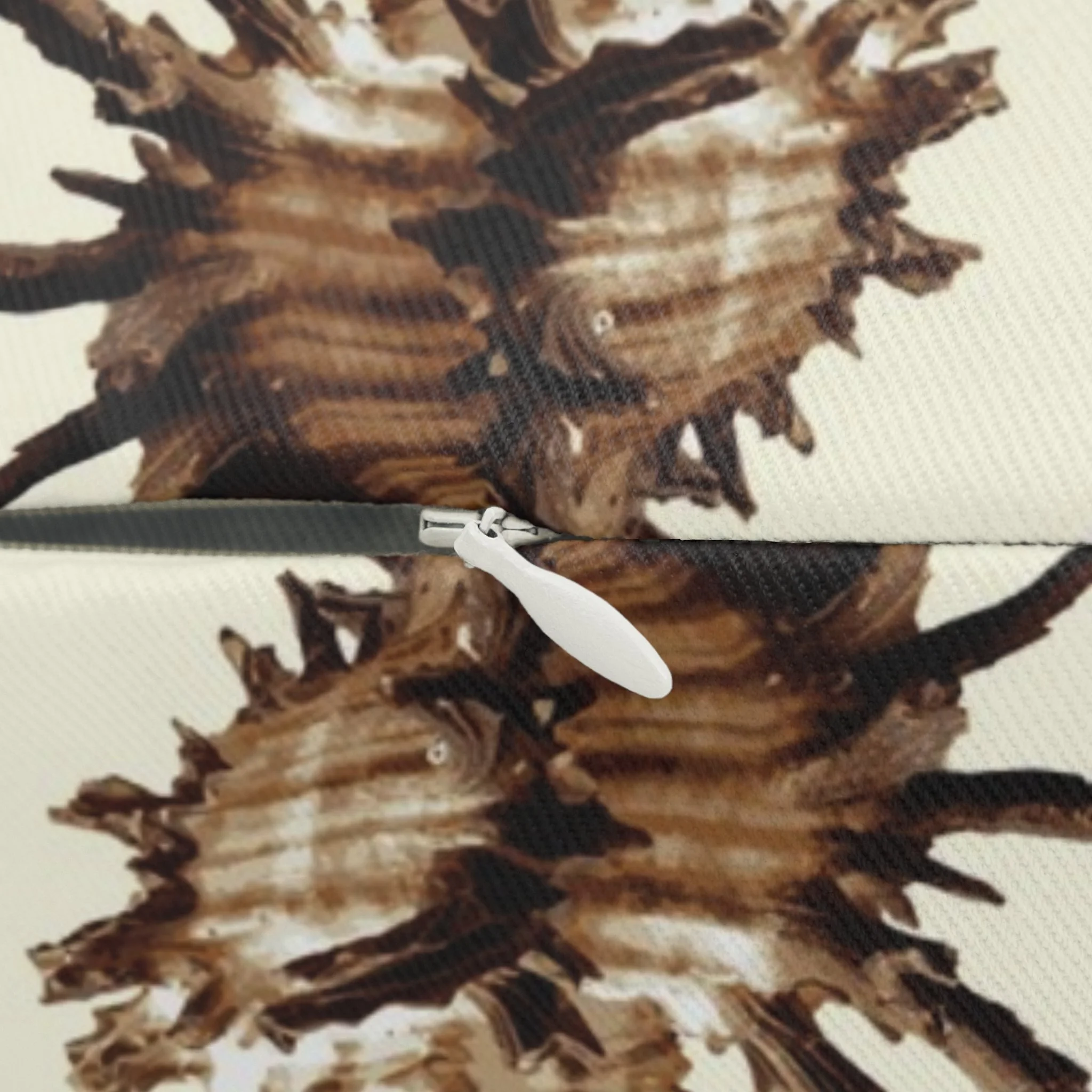 Spiky Conches (on Very Pale Yellow) - Lumbar Pillow Close-Up.png