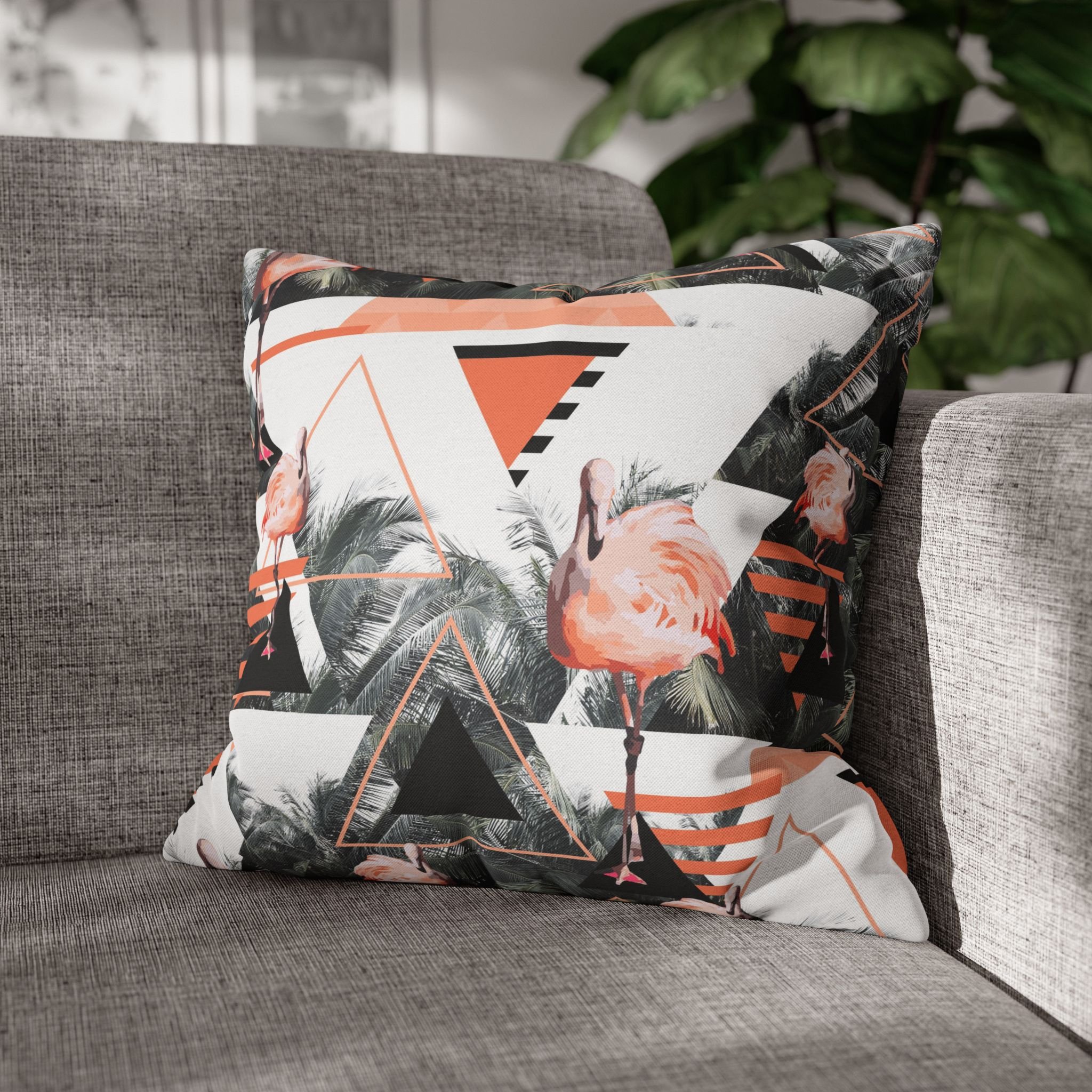 Black Beach Flamingos - Pillow on Couch.png