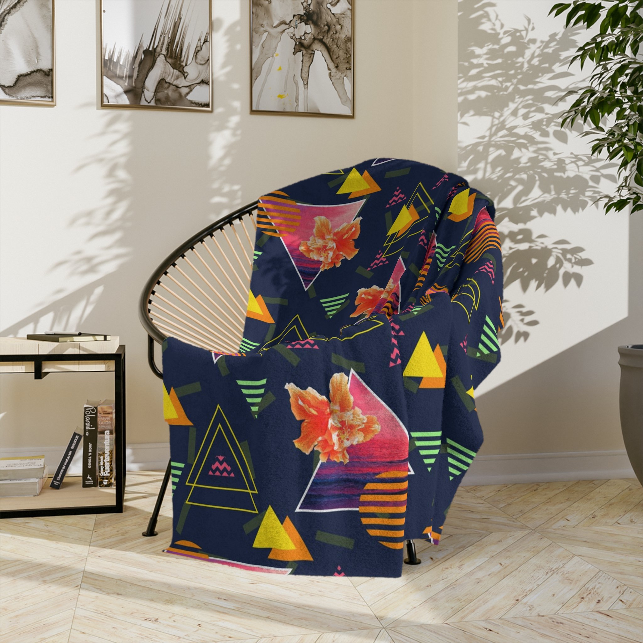 Hibiscus Sunrise - Fleece Blanket - On Wicker Basket Chair.png