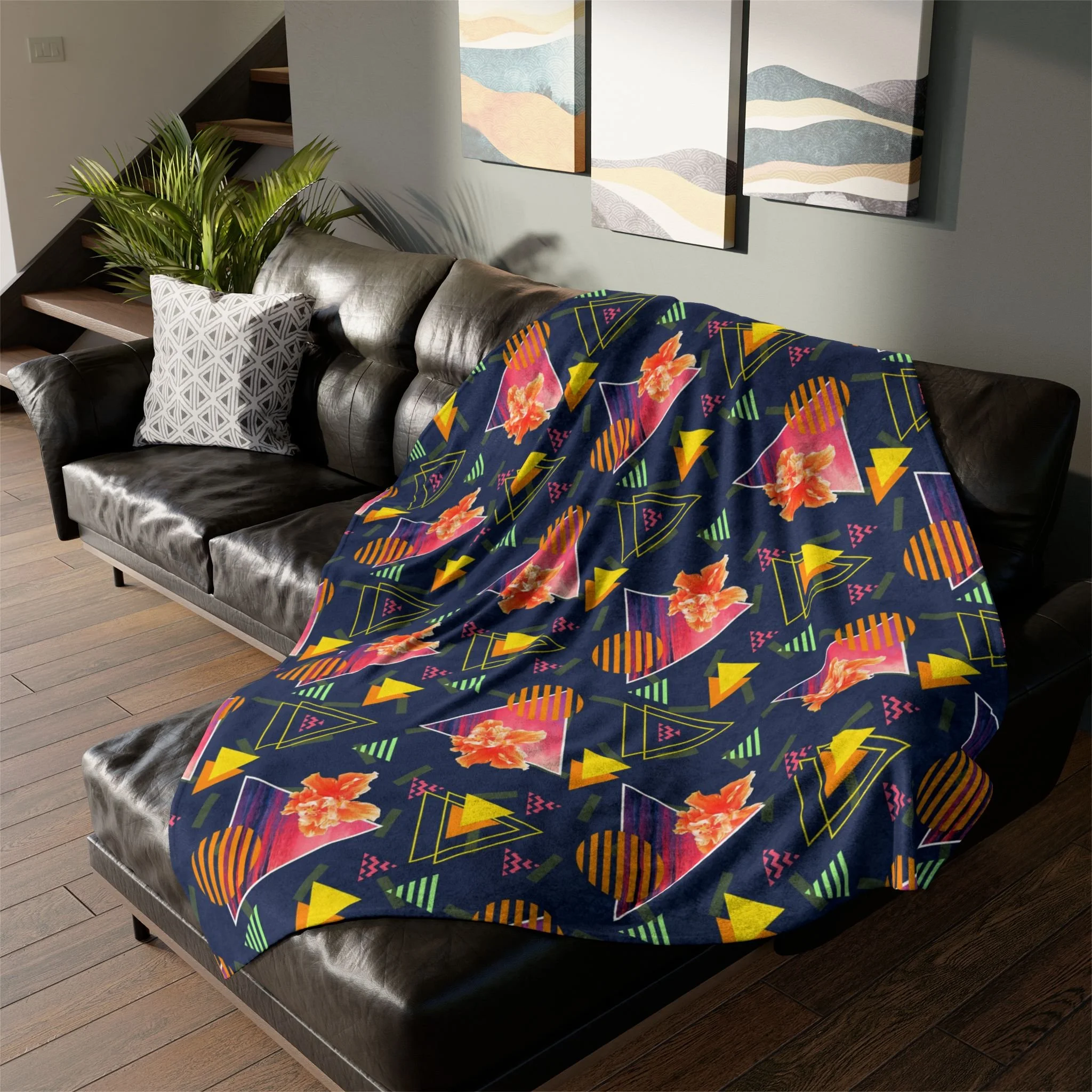 Hibiscus Sunrise - Fleece Blanket on L-Shaped Sectional.png