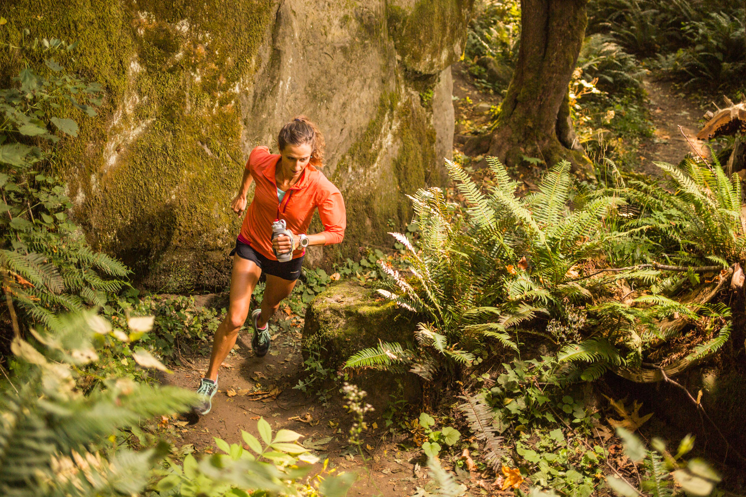 Prolific ultrarunner, Krissy Moehl running through her local trails in the Chuckanut Mountains, Bellingham, Washington. 