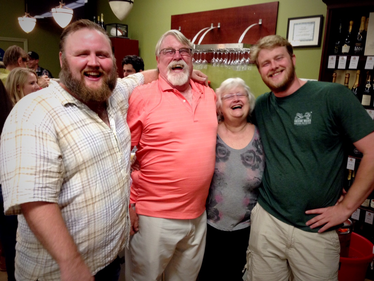 Eric and Evan Cripe hanging with their parents at Eric's "Last Call" beer tasting at The Jug Shop