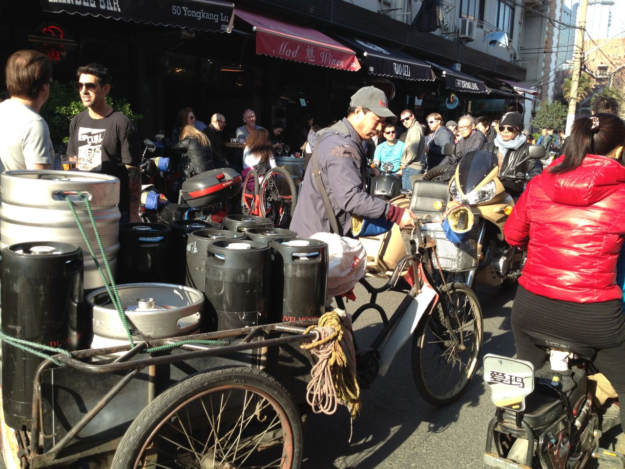 It does not look like the easiest job to be a supplier to the cafes and bars at Yongkang Lu on sunny days