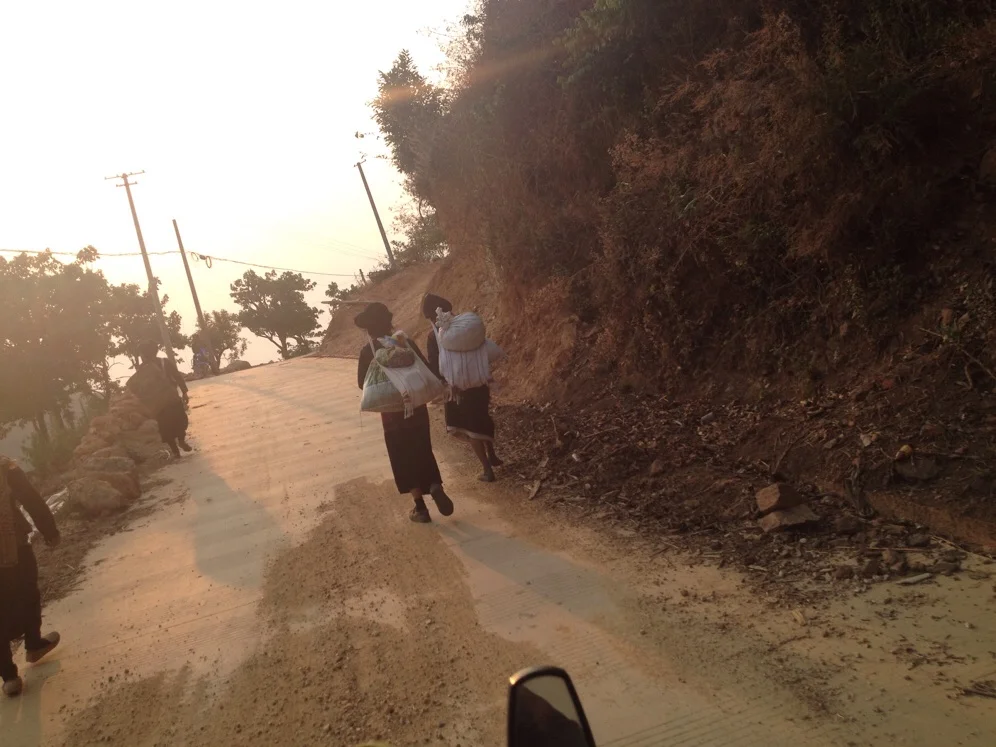 Locals walking into Zhenglang