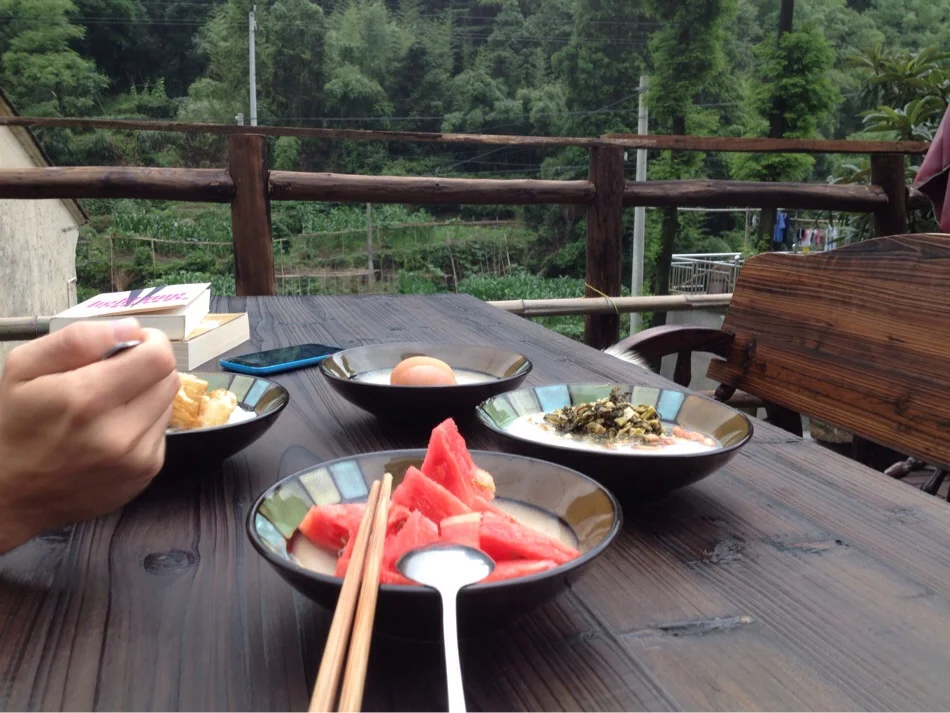 The yummy Chinese style breakfast which is included in room prices at Bamboo View Guesthouse. For RMB 25 extra Lanying will serve it with a latte on the side
