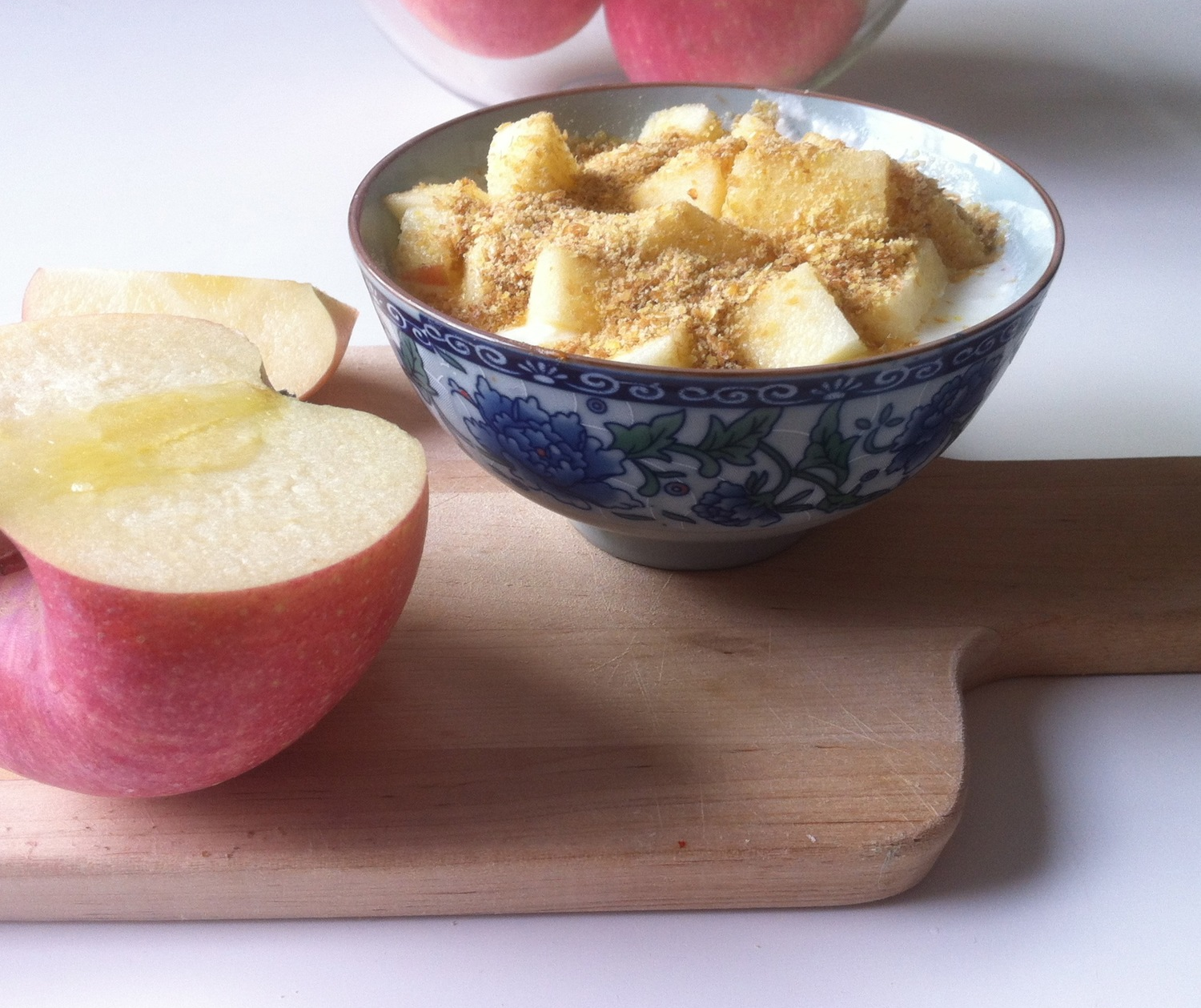 Homemade natural yoghurt with Qixia apples and grounded flaxseeds