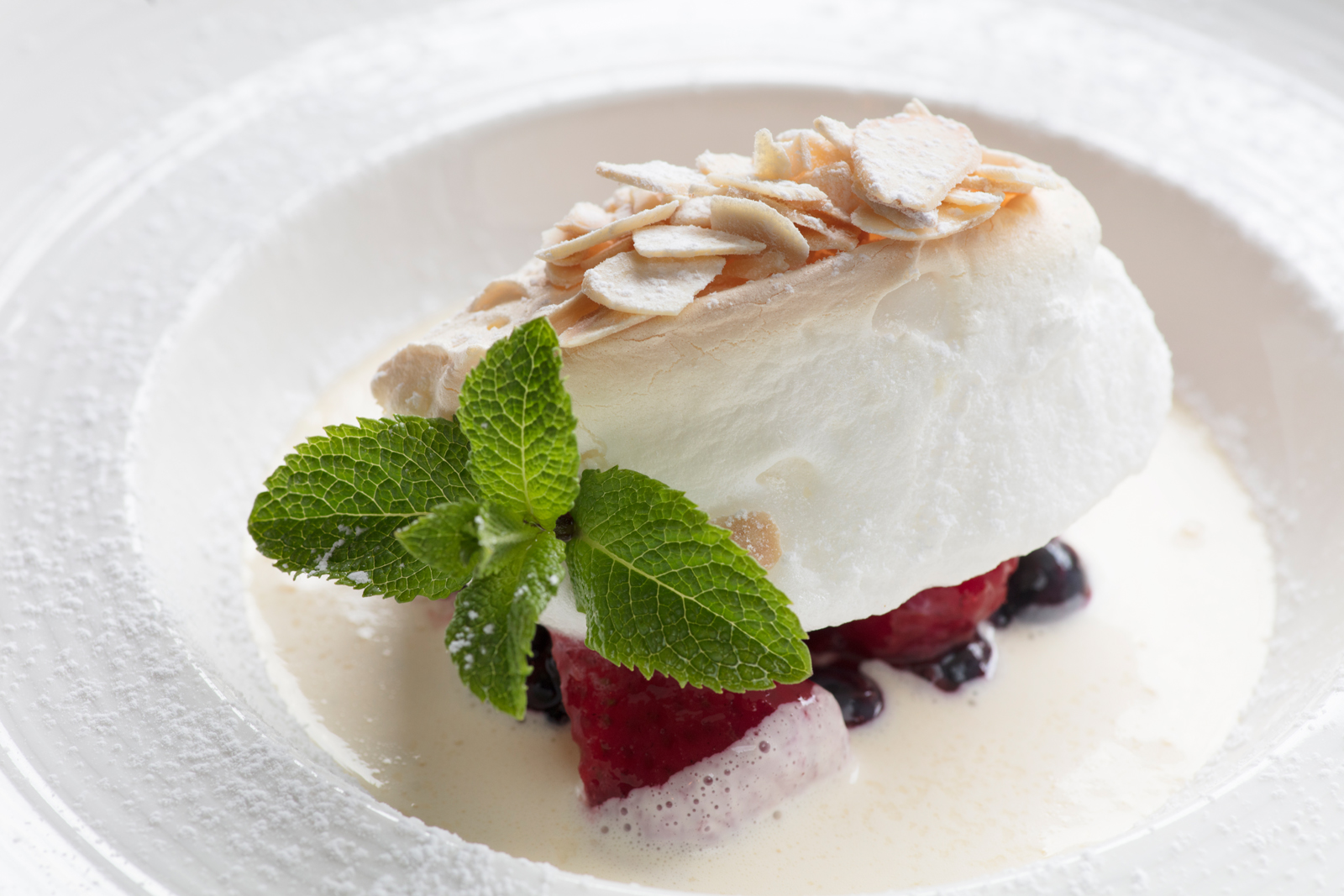 Baked Isle Flottante with Summer Berries & Toasted Almonds