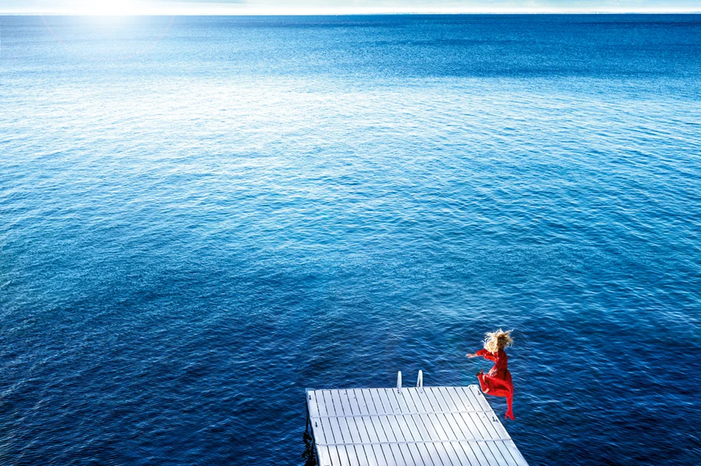 JUMPING INTO THE BLUE Photo © 2017 David Drebin. All rights reserved.