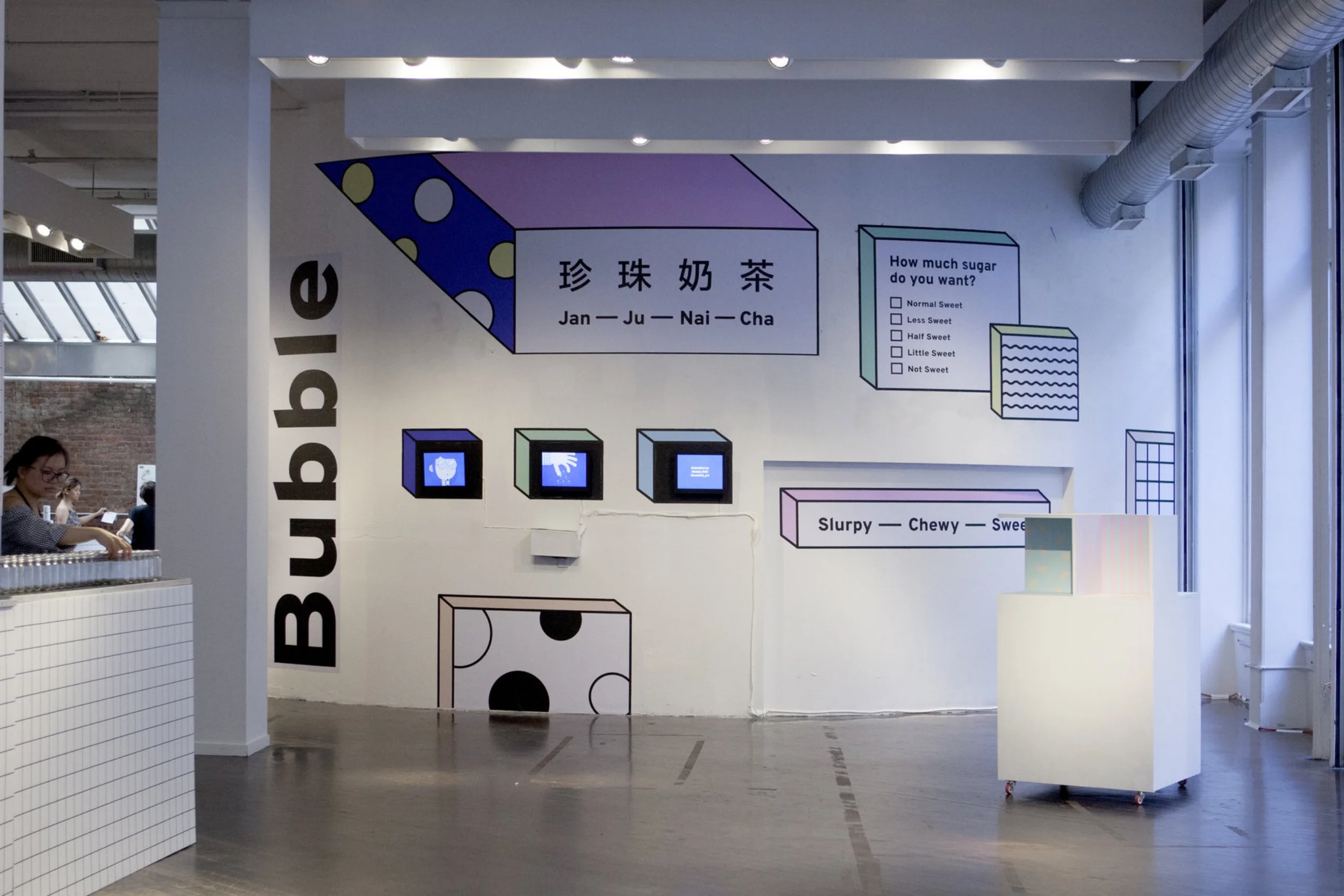 There are digital frames showing the animations made for the event. There were also photo booths for visitors to take pictures of their own bubble tea.