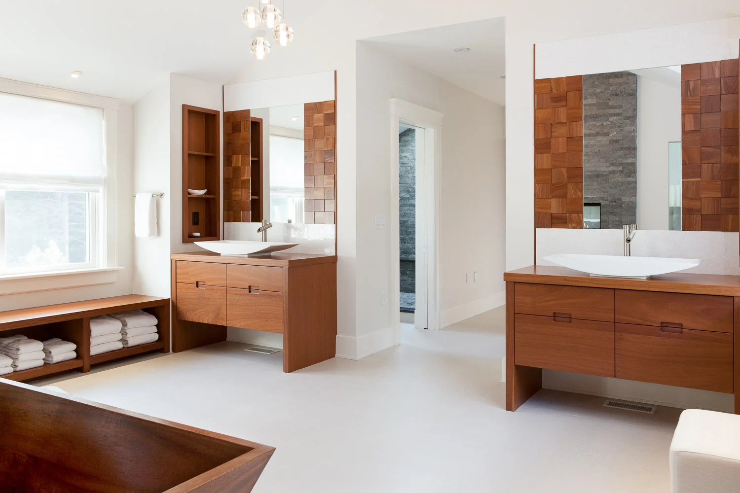 master bathroom with wooden tub