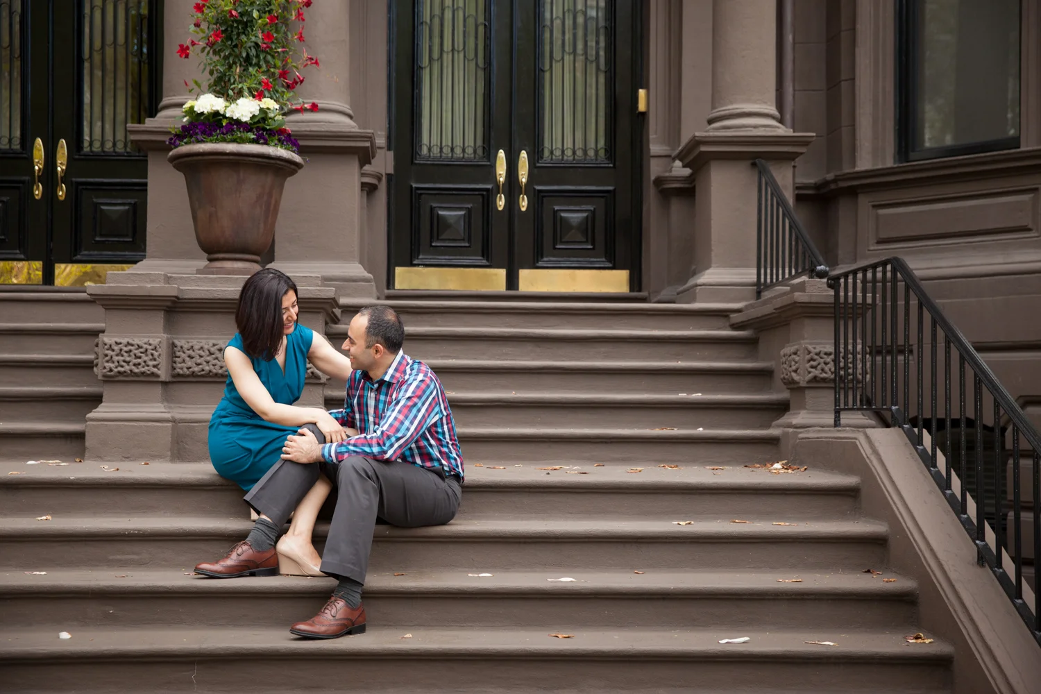 couple-sitting-on-brownstone-stairs-commonwealth-avenue-boston-back-bay.jpg