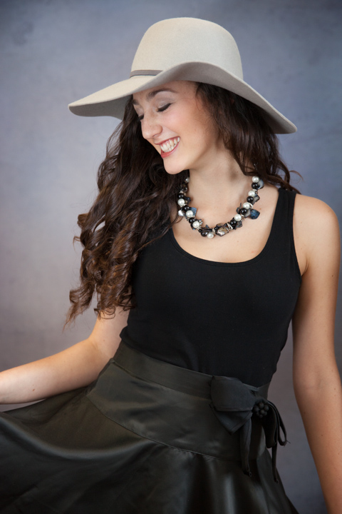 For this high school senior, we wanted to keep the look simple, but still cute and girlie, to focus on her gesture and expression.