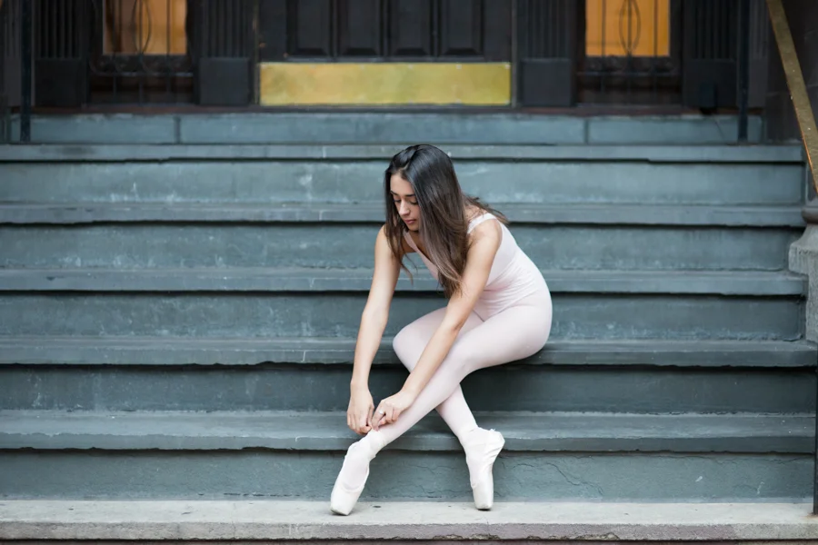 ballet-dancer-urban-landscape-tying-shoes.jpg