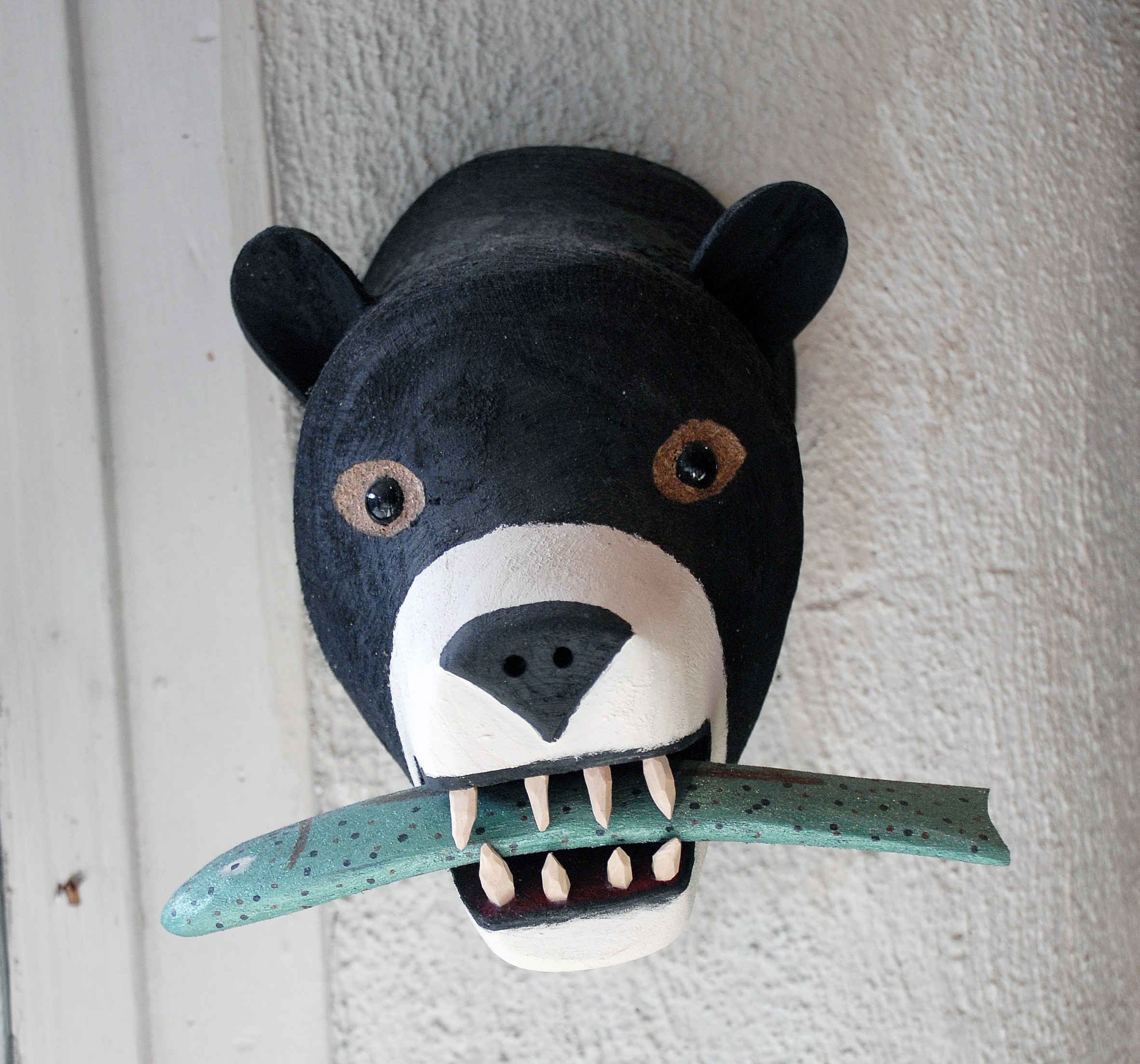 Bear head with fish in window.jpg