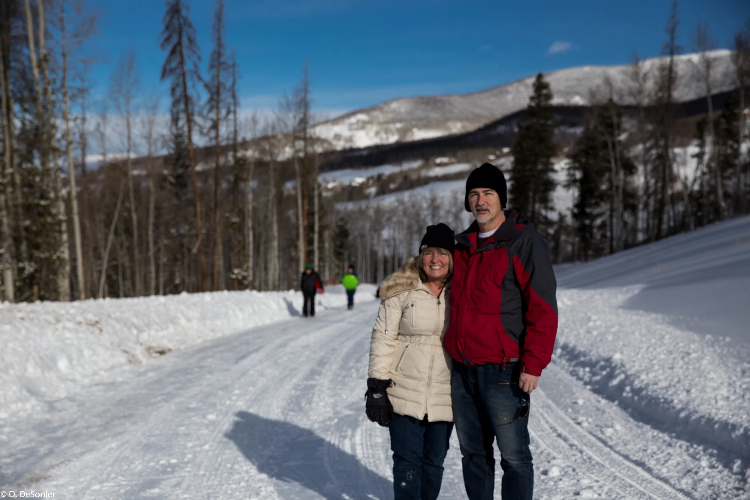 Roanne and Dave -- sledding with the kids.