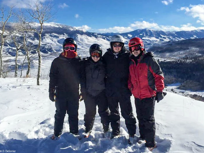 The guys out snowmobiling.