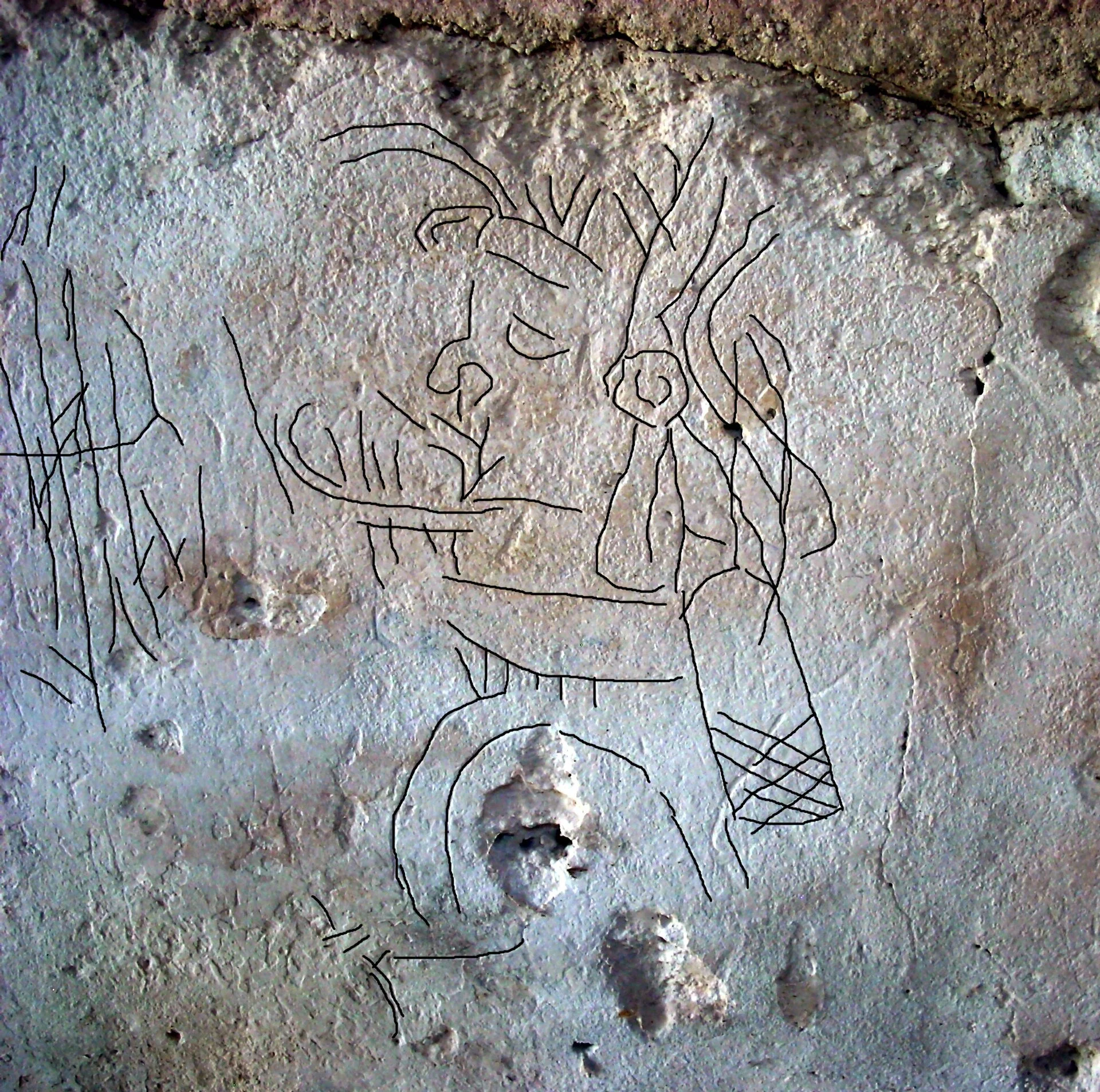 Graffiti maya incisos en un muro de La Blanca, Petén, con líneas realzadas digitalmente