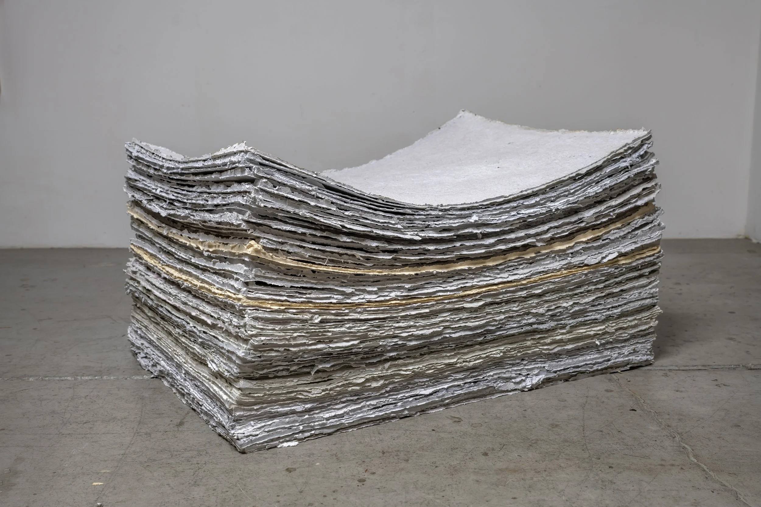  Paper Work, 2019-2020 80 sheets of hand-made paper from outdated office files 16.5"H x 30"W  x 23"D 