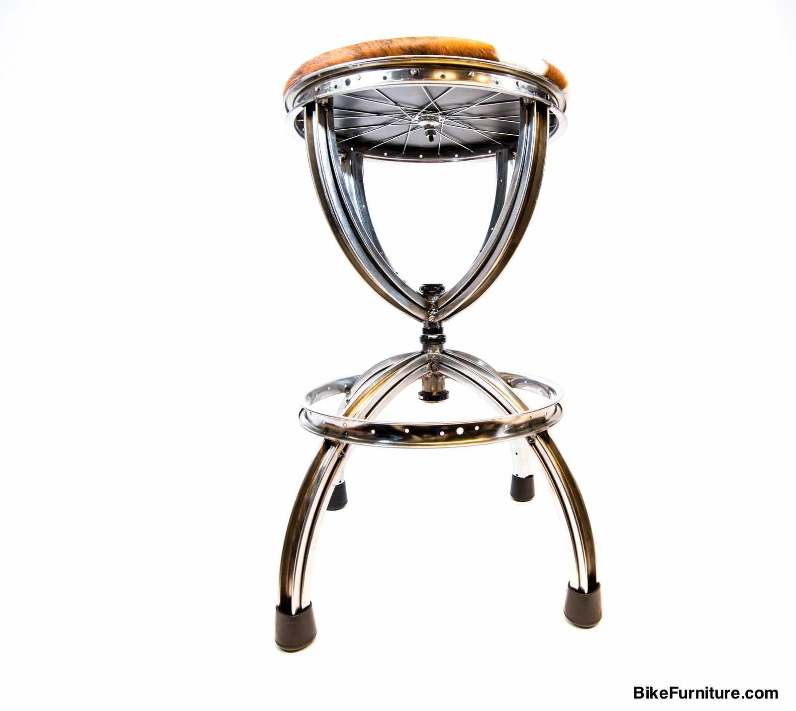 Crown swivel Barstool (shown with cowhide cushions) Swivel mechanism is the headset bearing component (available in colors) from a bicycle. Can also be made with a back.