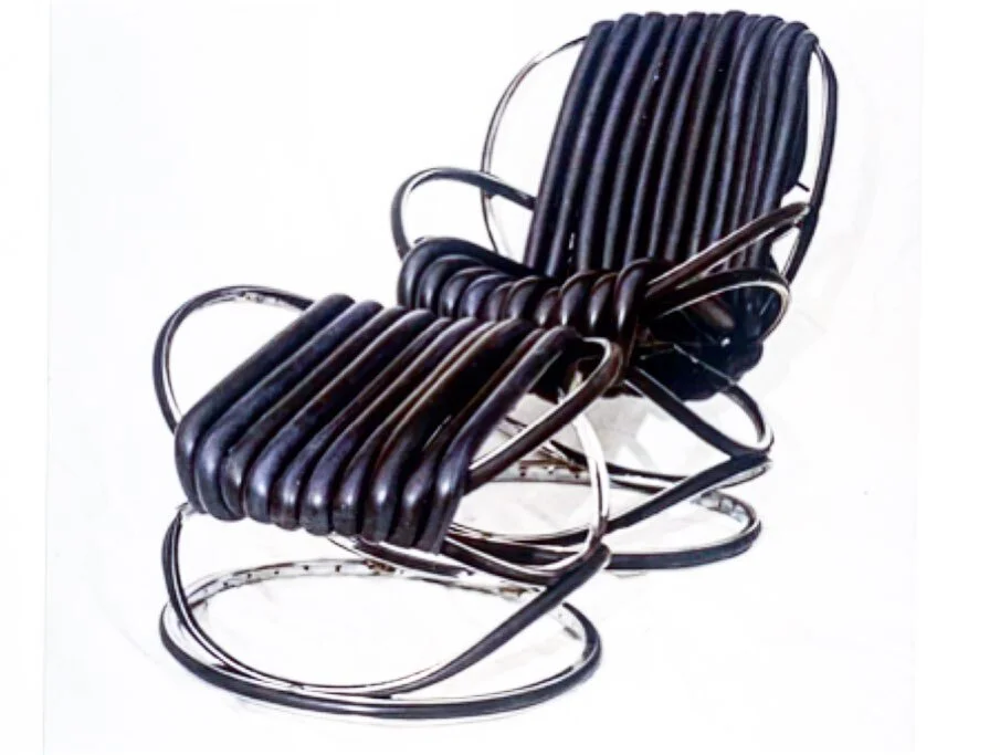 Modulus Lounge Chair and ottoman, 1998ish. Chromed steel bicycle rims, stainless steel spokes, inflated rubber inner tubes. I constrained myself to only using wheel components. Before being destroyed by fire a few years later, the roof trusses of 610