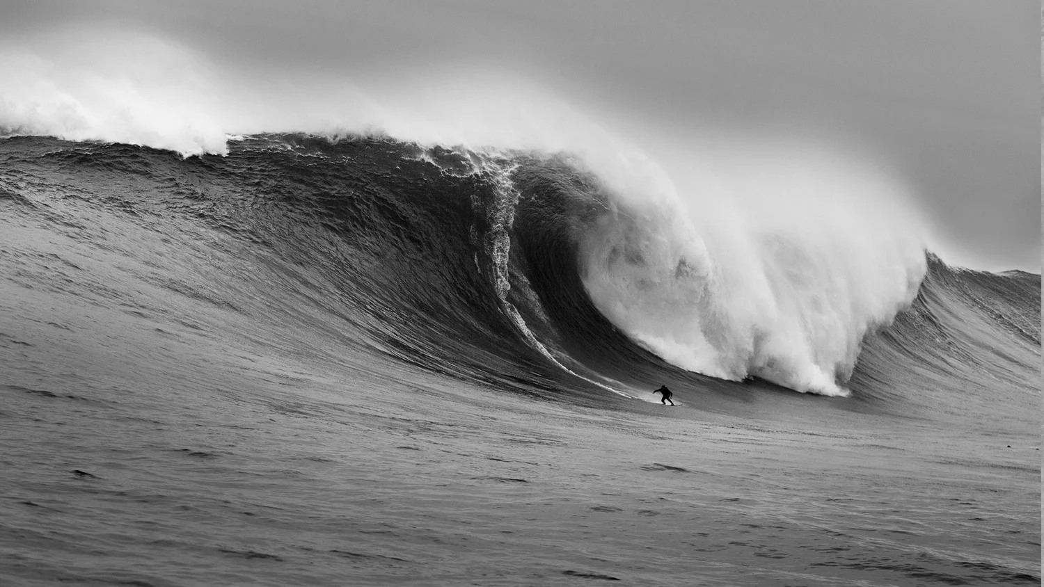 The above image of Greg, in the words of photographer Al Mackinnon: “I've been blessed to have seen some breathtaking sights, but this particular moment will live long in the memory. This photograph of Greg Long riding this monster at Dungeons, South Africa, won Greg and me the Billabong XXL Biggest Wave Award 2006/7 (now WSL Big Wave Awards) for ride and photograph. Incredibly, Greg is not just a phenomenal surfer, but also a gifted orator, particularly in raising awareness for environmental causes worldwide.”See more of Al’s incredible work in this article .