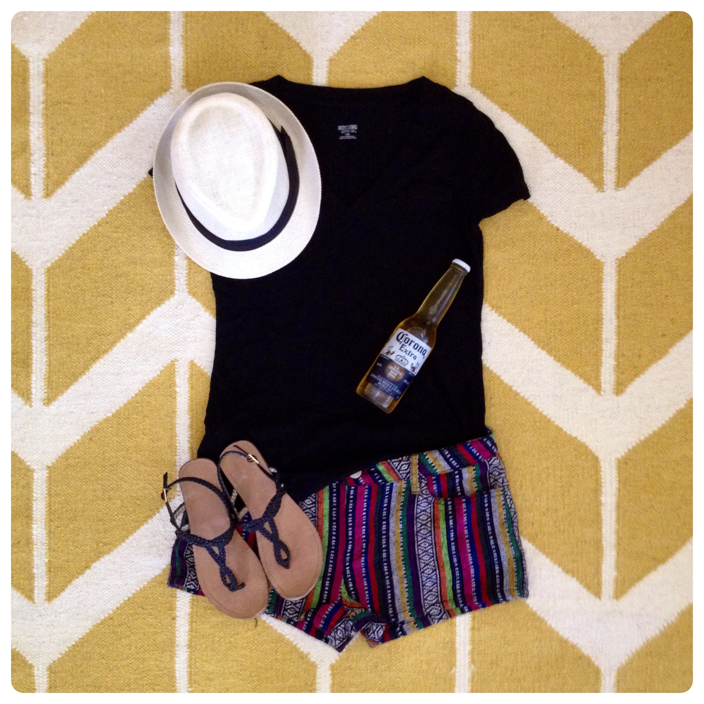 Woven Textile Shorts - Forever 21 $15.80 I loved these shorts. They remind me of a mexican blanket or the seat covers my dad had in his pick-up truck growing up. I thought this would be perfect for day 1 because the shorts have pockets I could stick tent stakes and such in when setting up camp. The Corona, just 'cause...vacation! From My Closet: Straw Fedora Hat - Target $13 Mossimo Boyfriend V-Neck Tee - Target $9 Sandals - Target $15